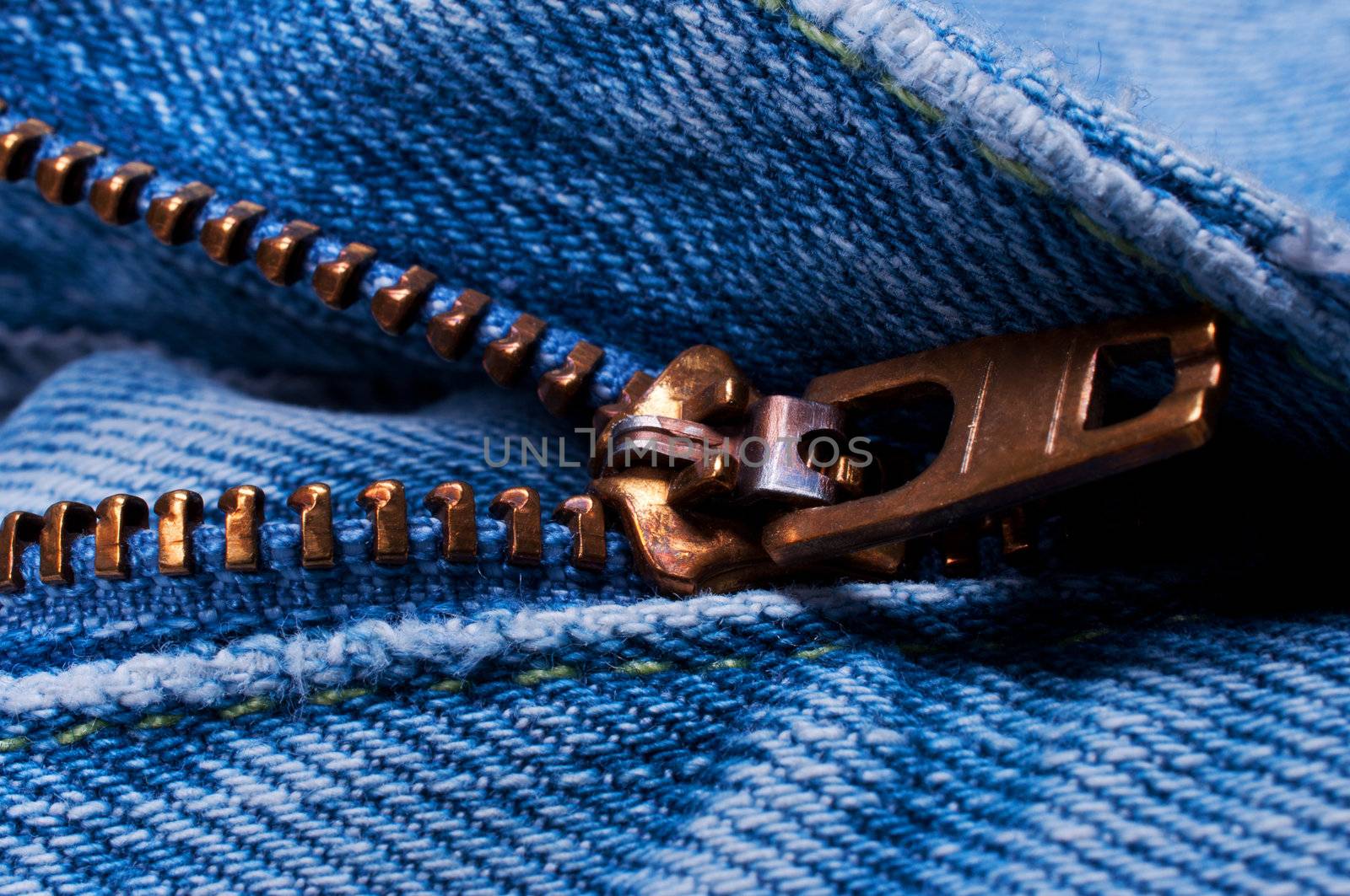 Close up of blue jeans zipper half open