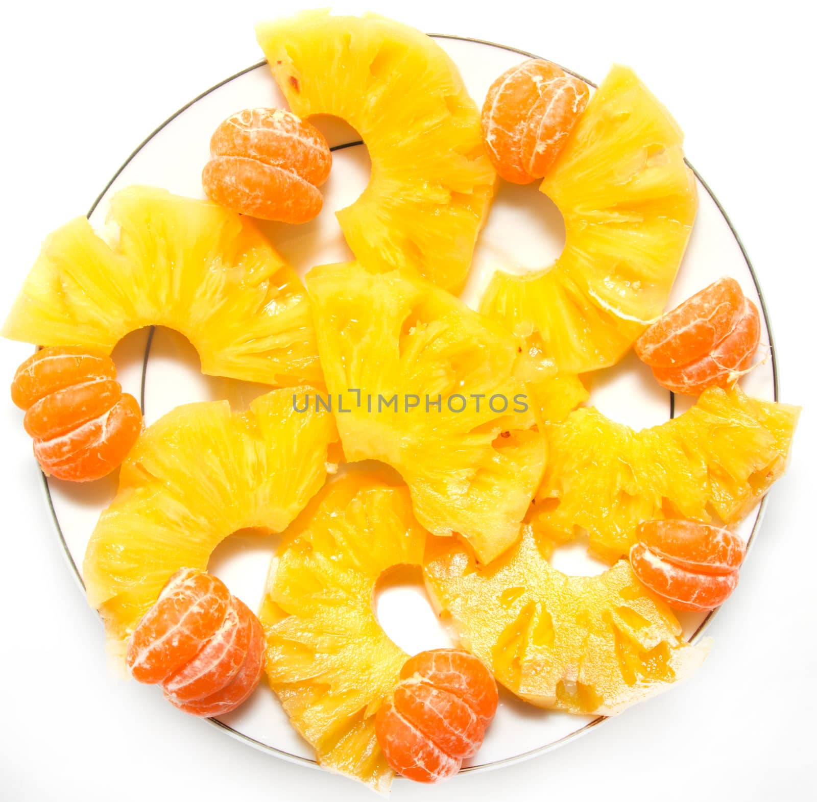 tangerines with pineapple on a white background