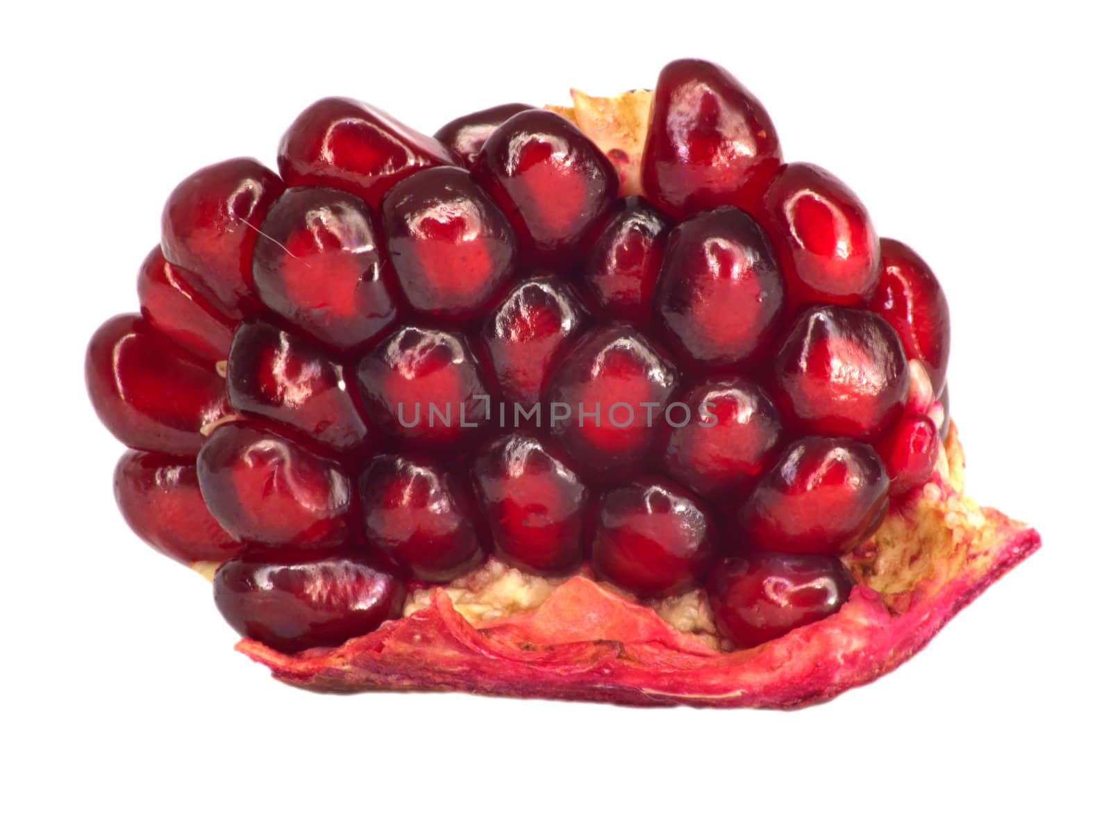 Extreme close up background of a red juicy ripe pomegranate fruit seeds 