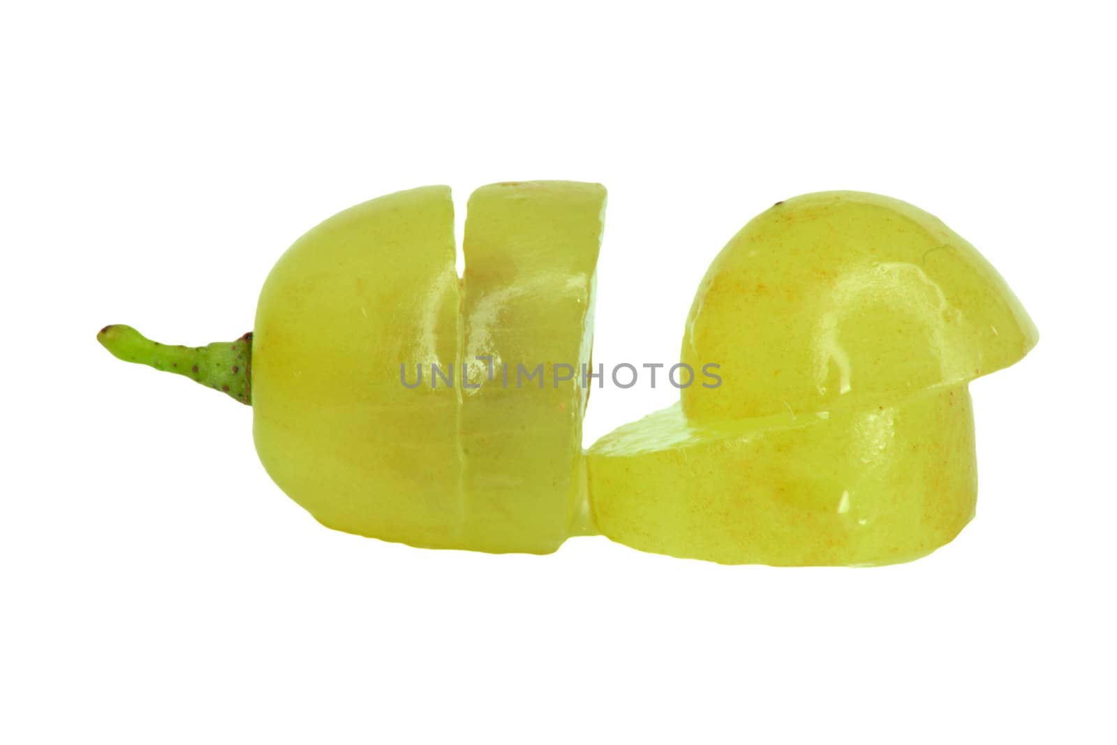 Translucent slice of green grape fruit, macro isolated on white 
