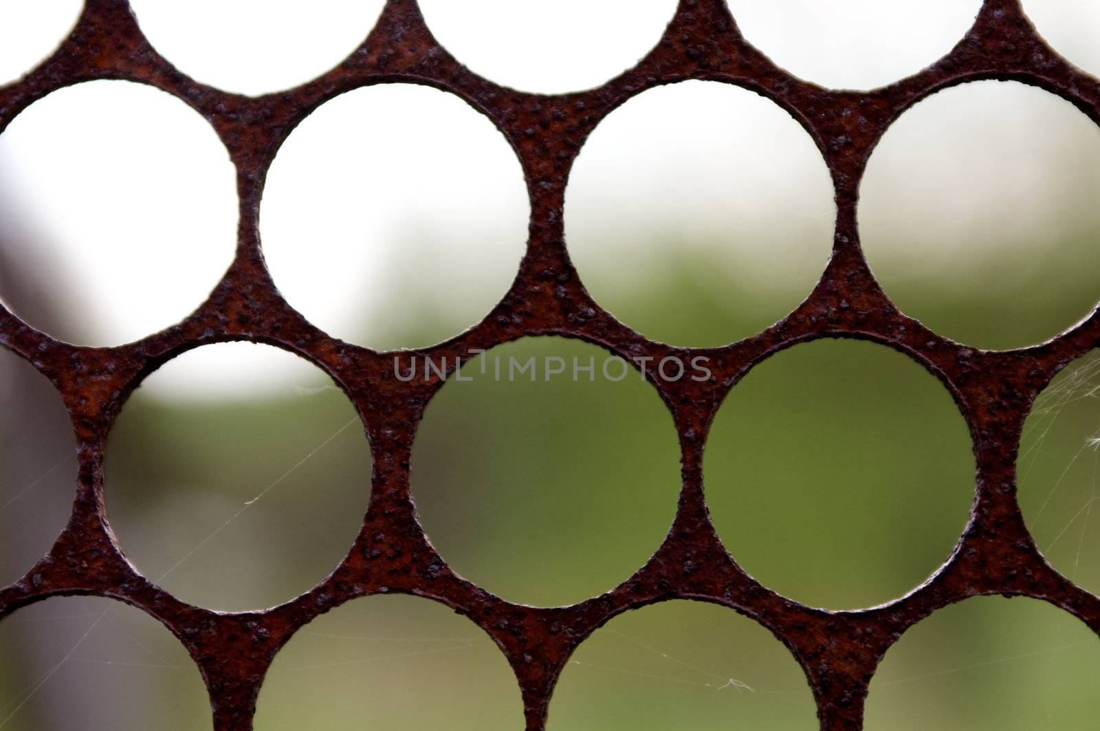 Mesh rusty metal grate as background