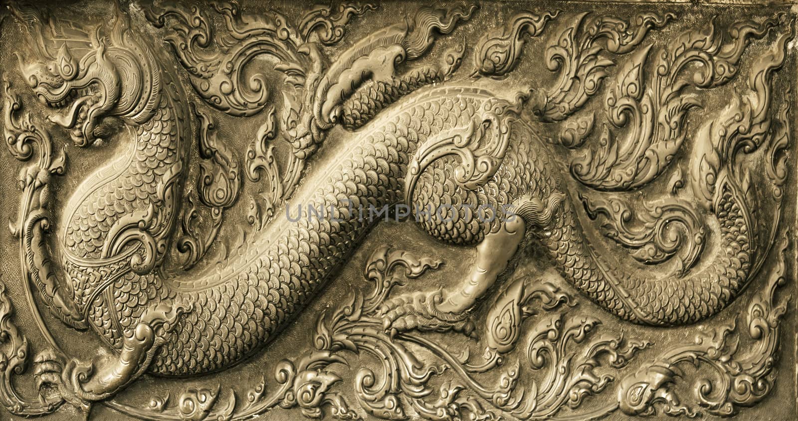 Dragon Chinese carved on stone wal