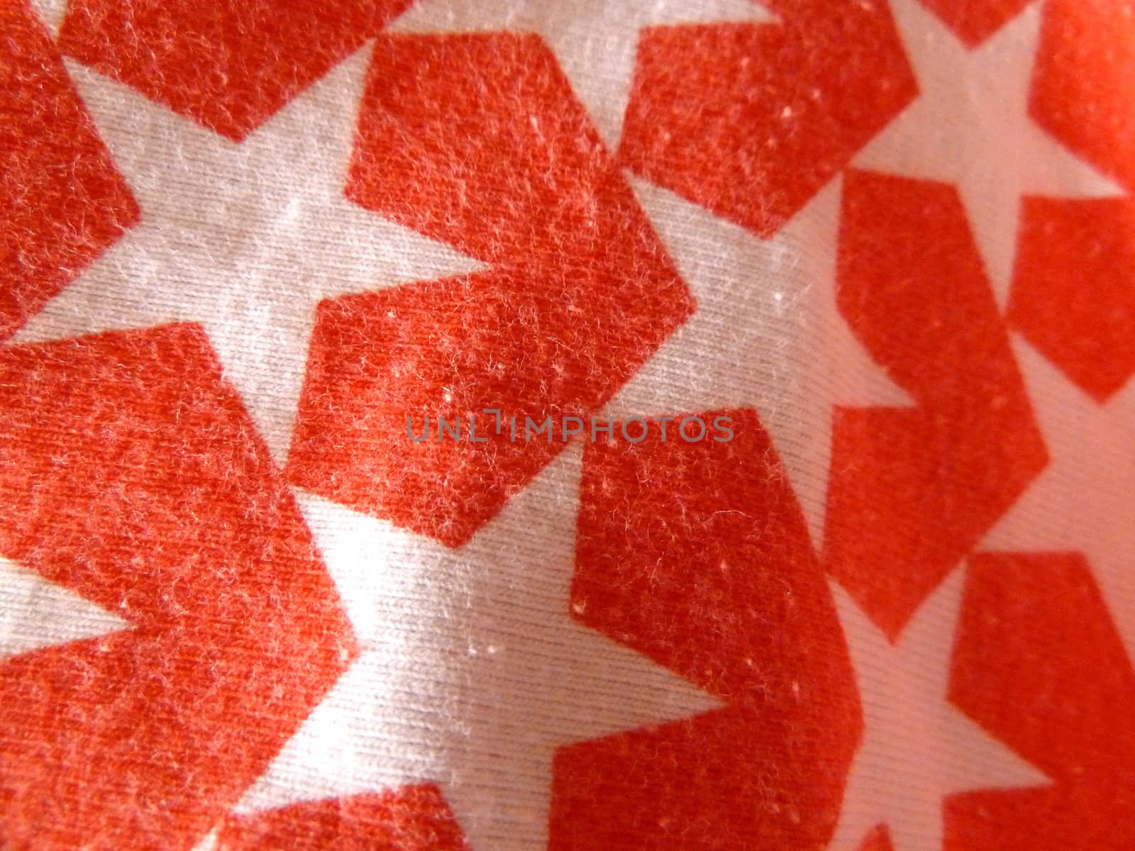 white star pattern on red fabric