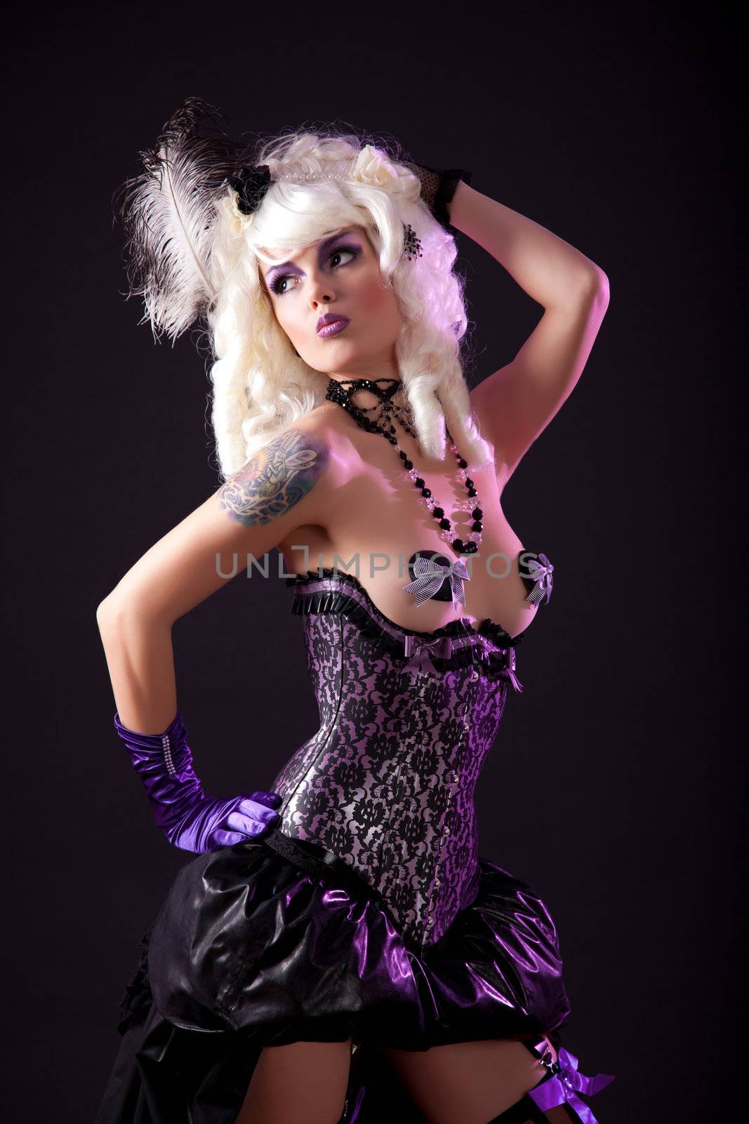 Sexy woman in burlesque outfit, studio shot 