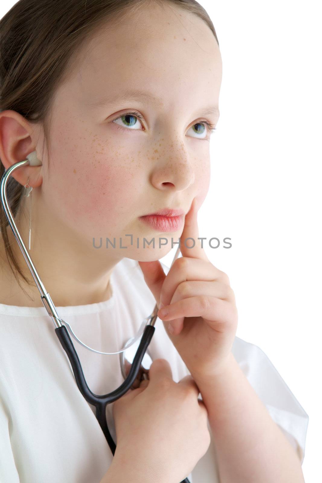Little girl with a white coat and stethoscope