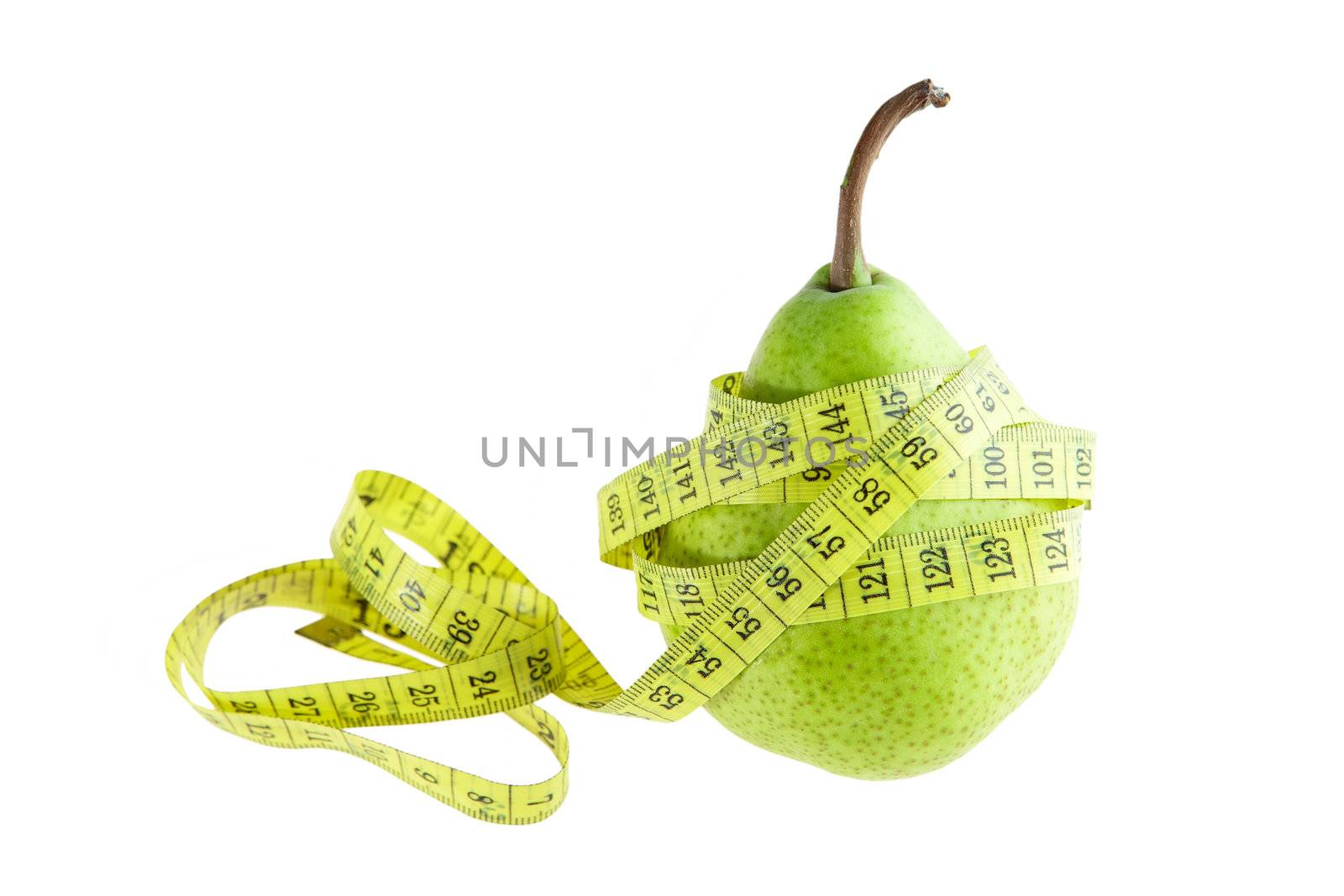 Ripe green pear with measuring tape