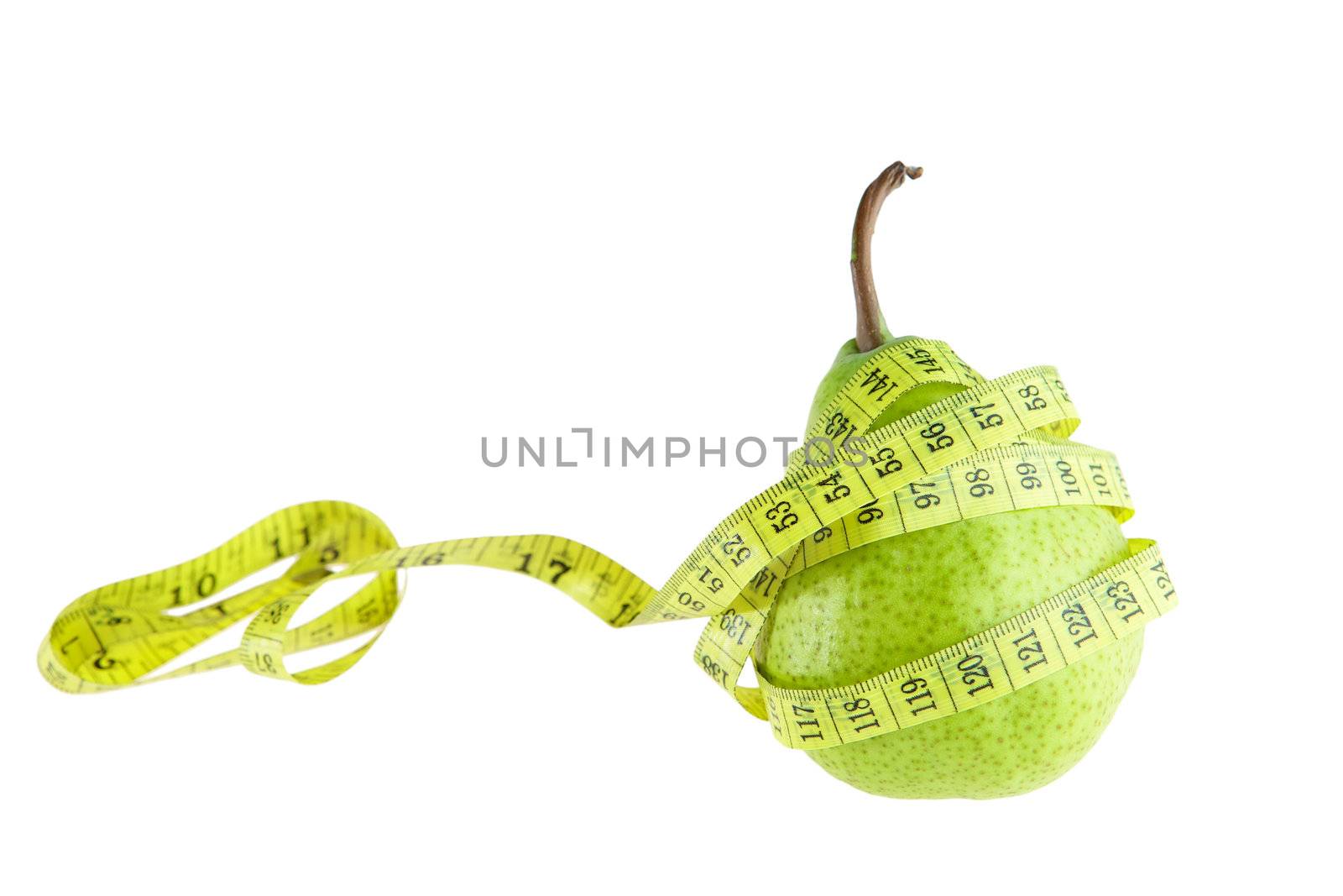 Ripe green pear with measuring tape