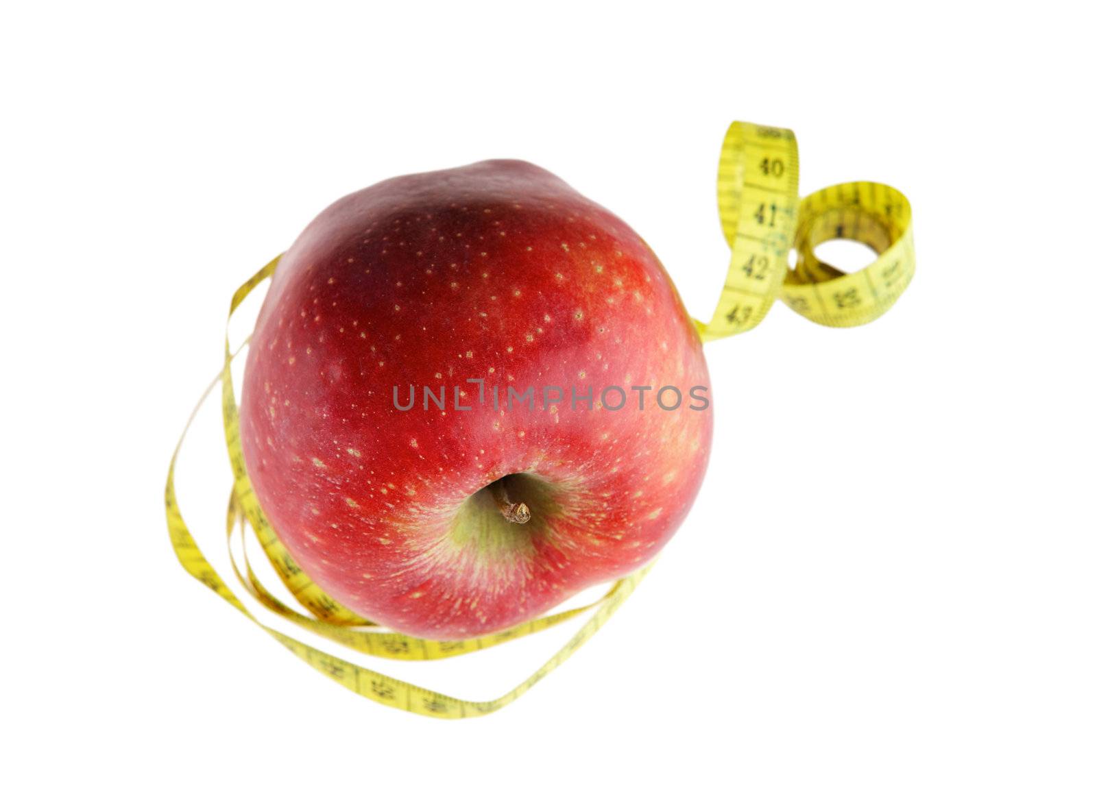 Ripe red apple with measuring tape 