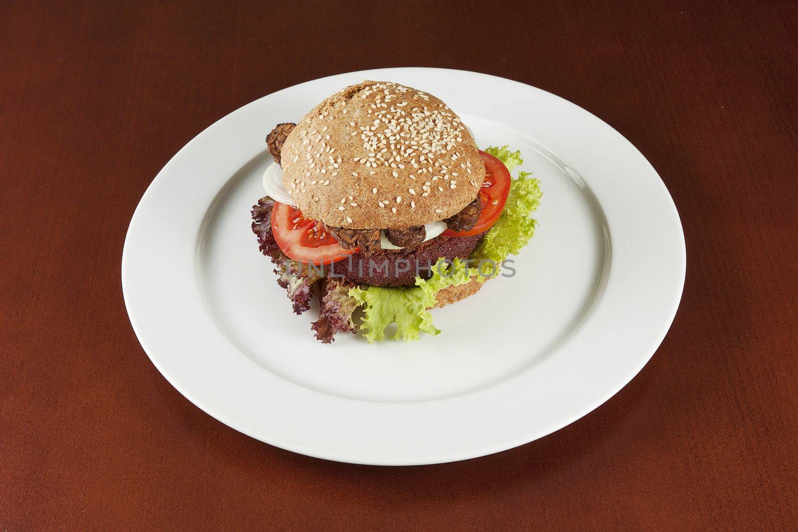 Macrobiotic burger on the white plate