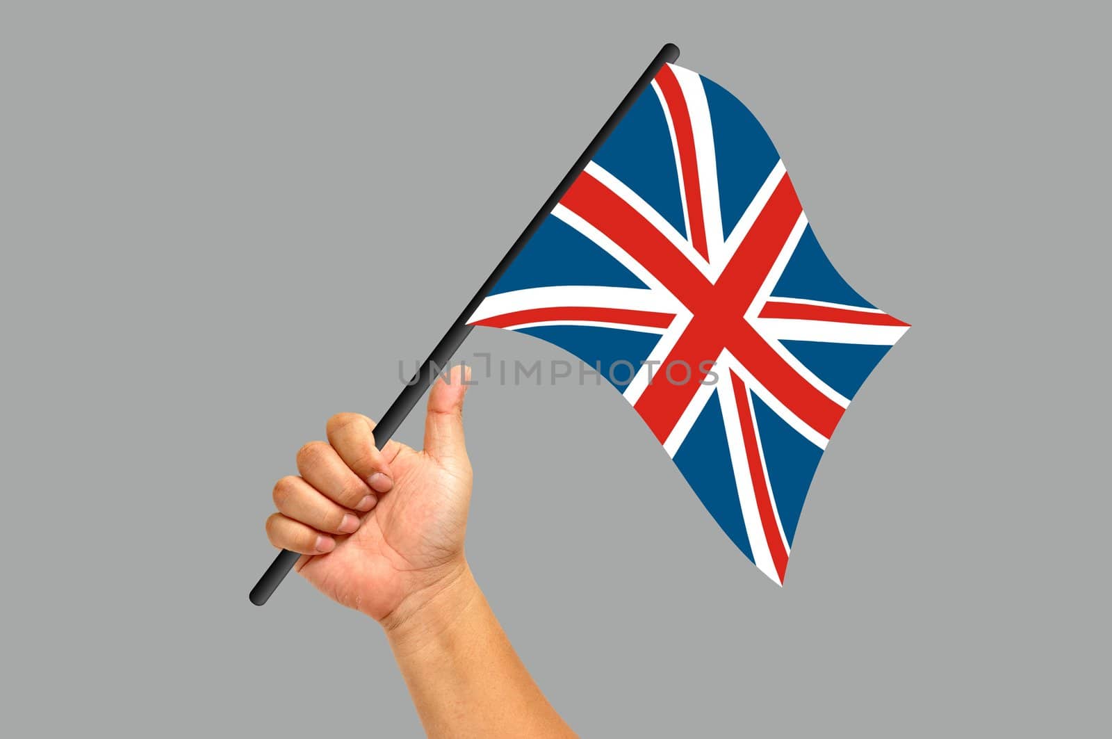 Hand holding England flag isolated on white background