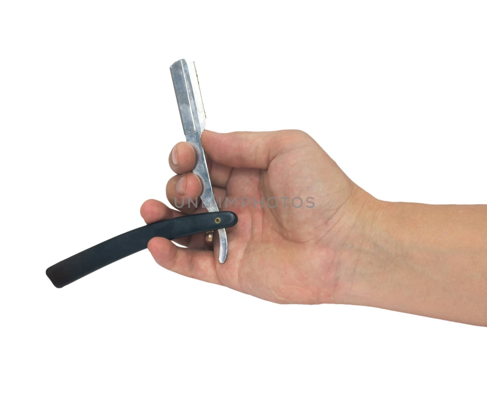 hand holding classic straight razor on white background 