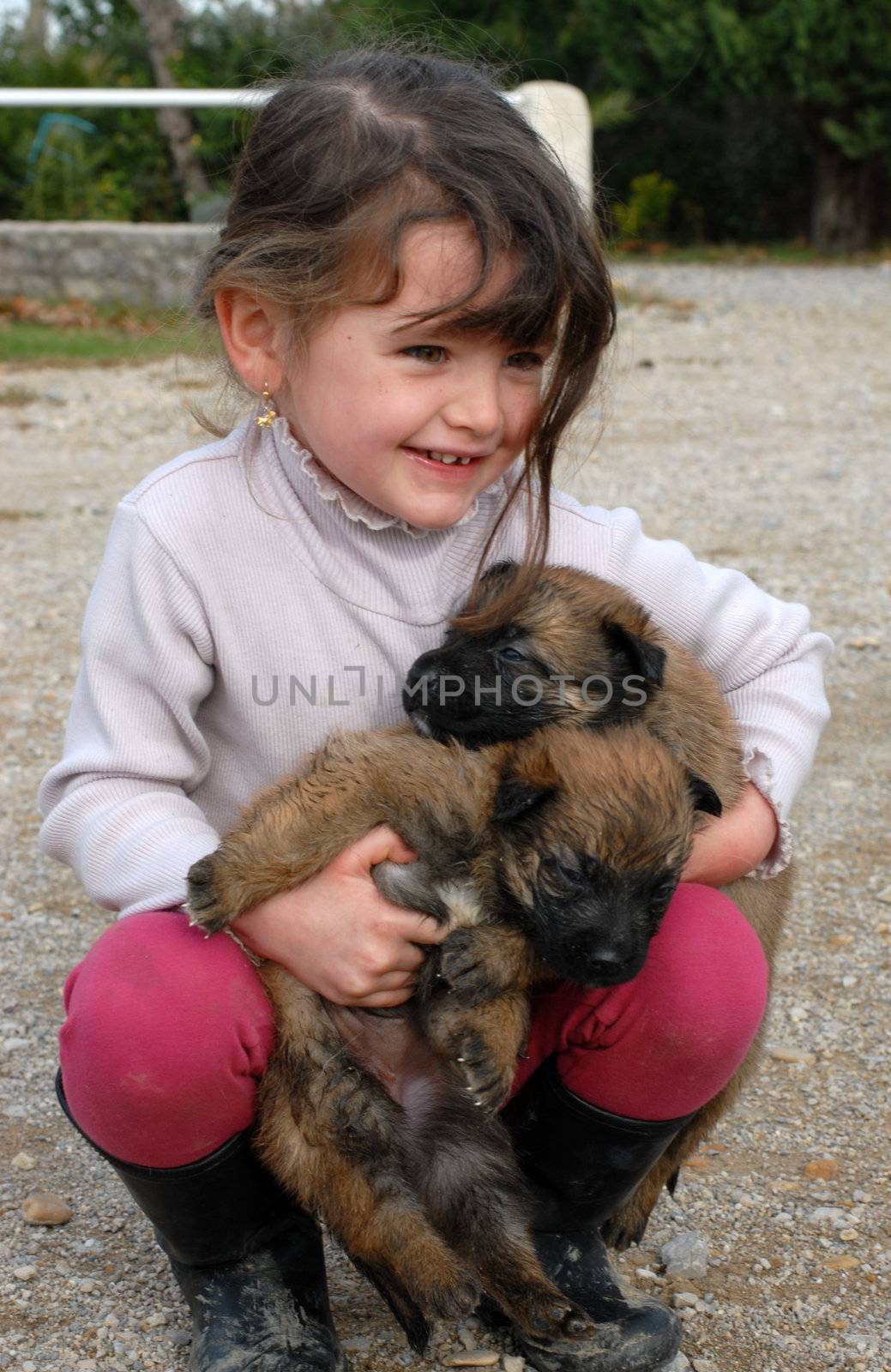 smiling girl and puppies by cynoclub
