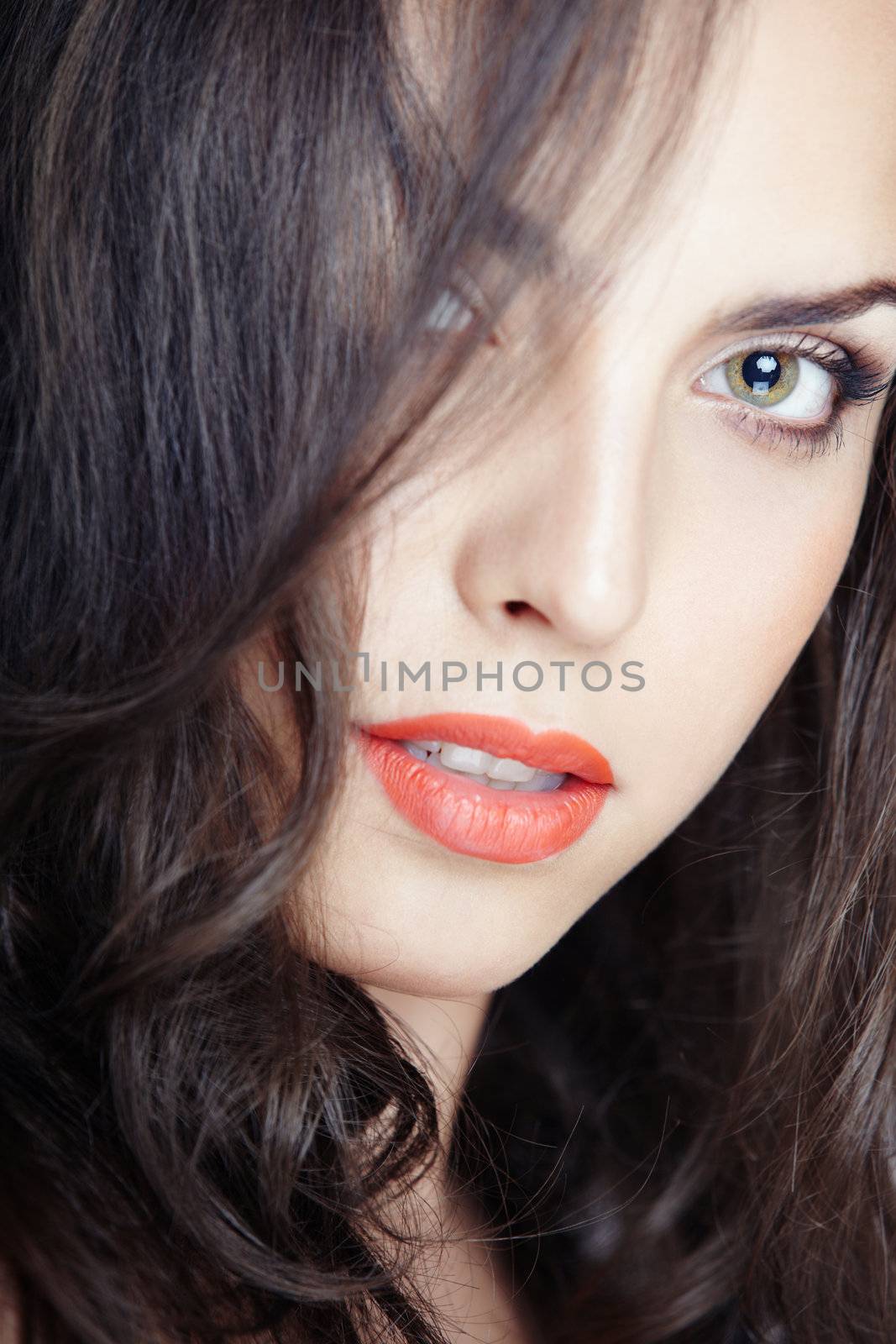 Close-up portrait of the beautiful woman with perfect makeup