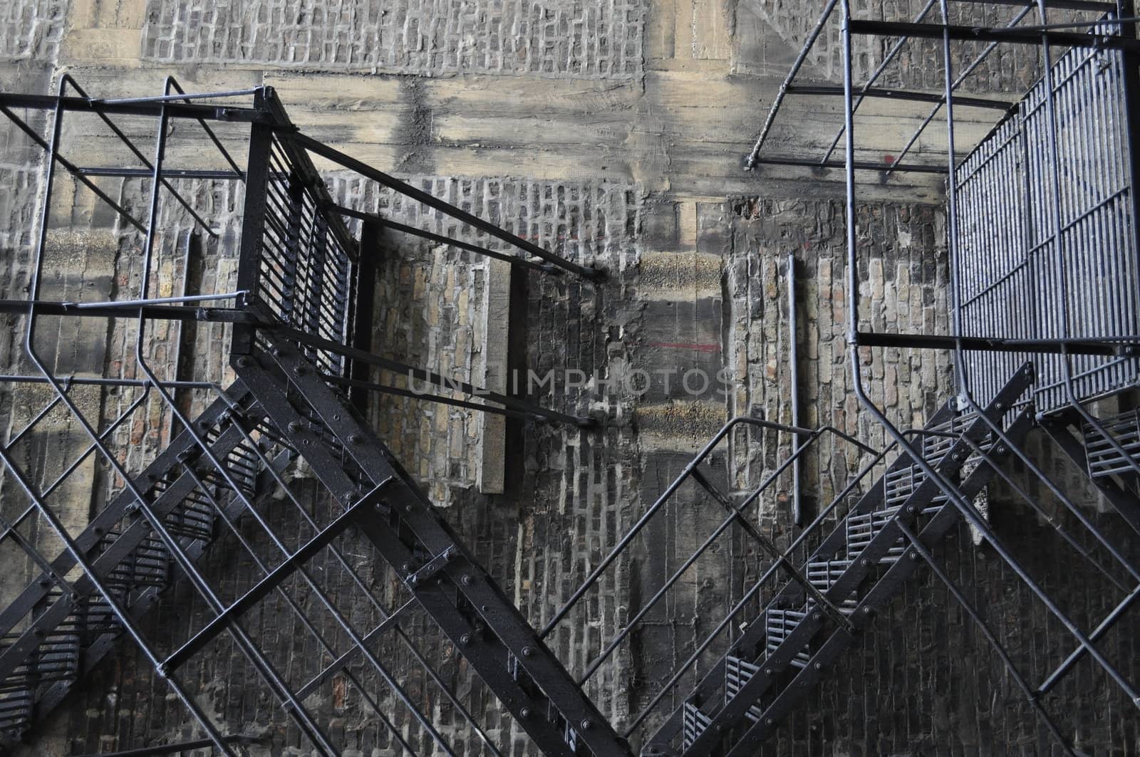 Metal fire escape ladder in an old building.