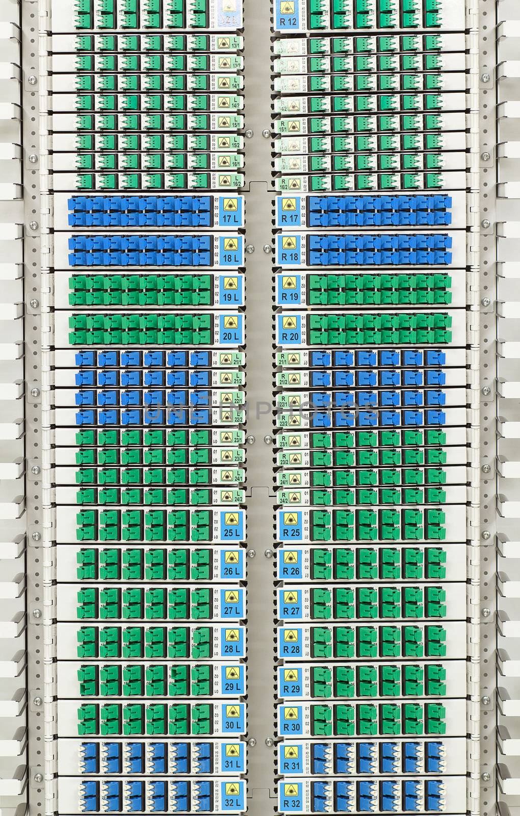 fiber optic cable management system with green and blue SC connectors