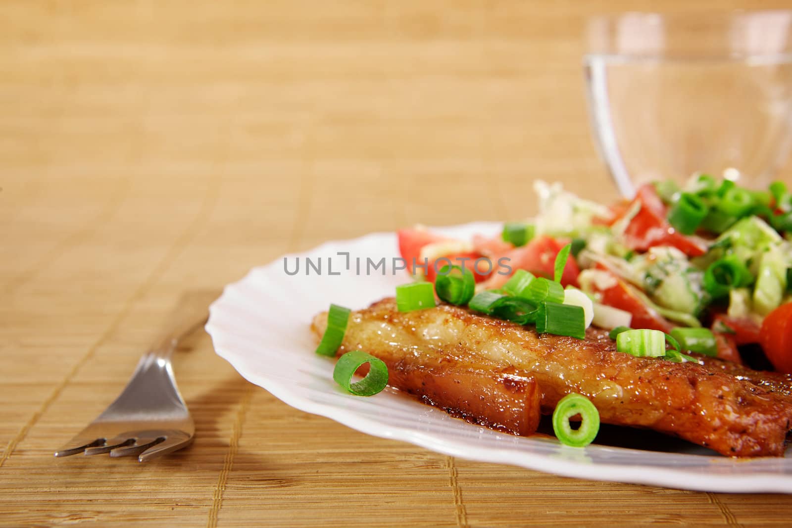 Fried meat with vegetable garnish