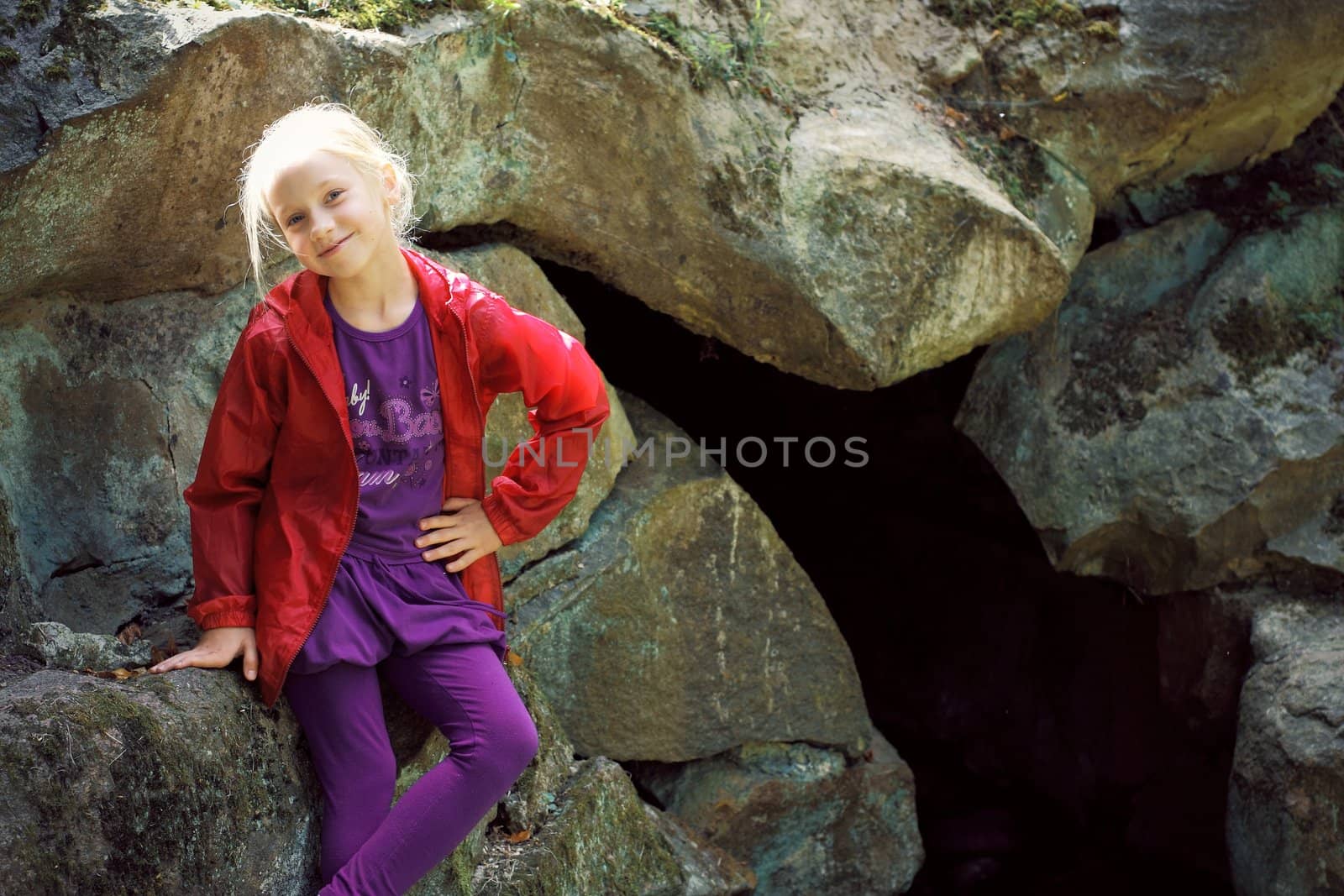 Portrait of Little Girl in Autumn Park