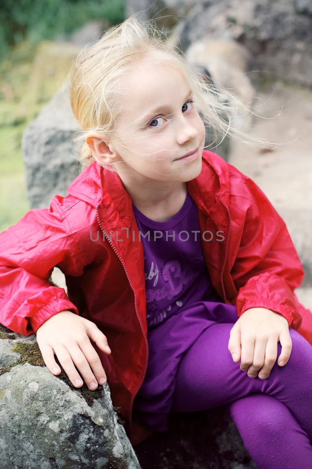 Portrait of Little Girl in Autumn Park