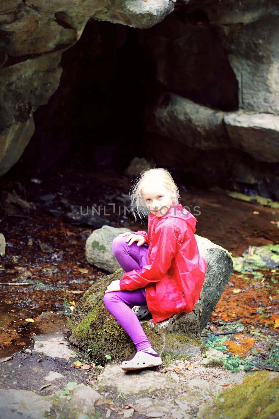 Portrait of Little Girl in Autumn Park