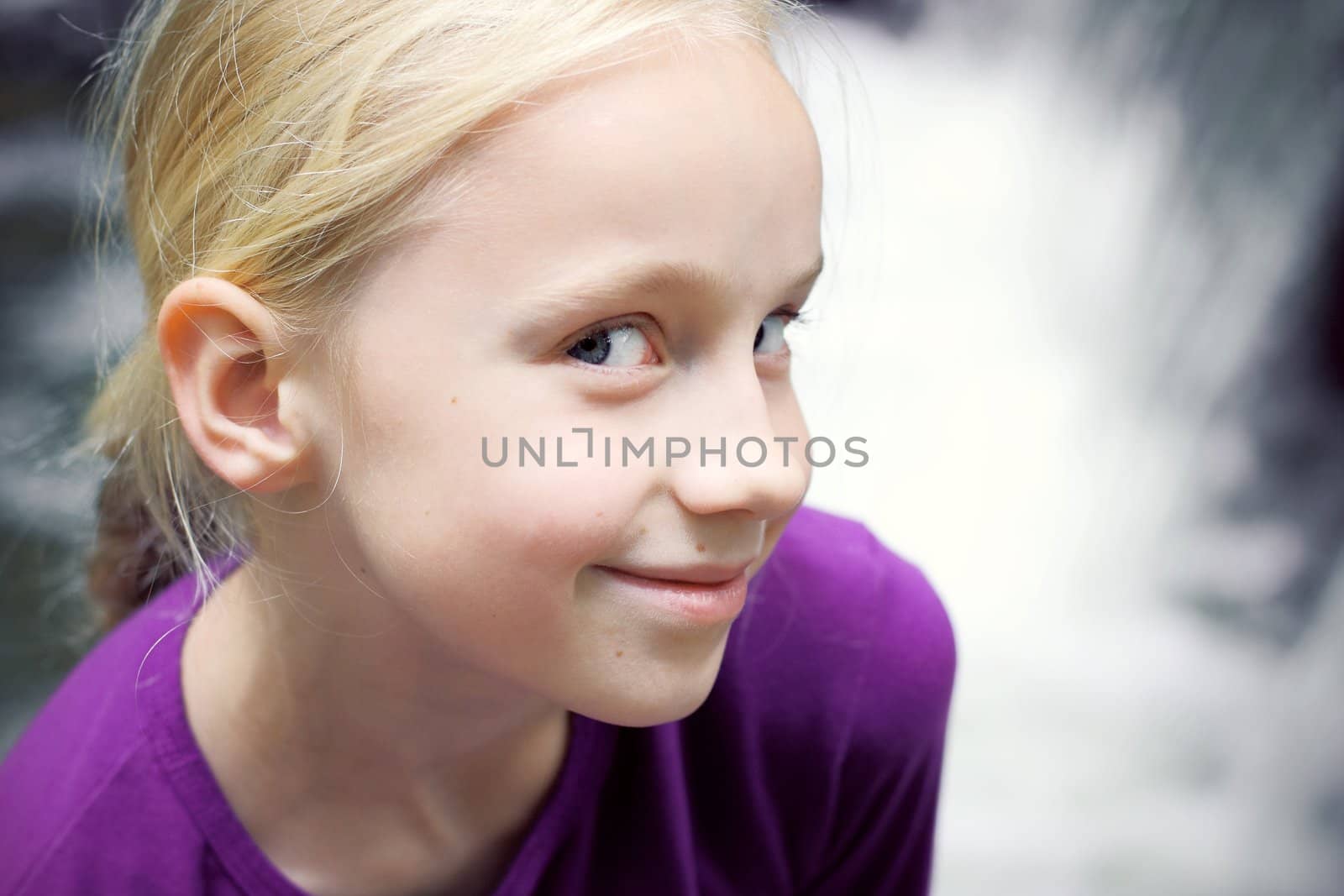 Portrait of Little Girl in Autumn Park