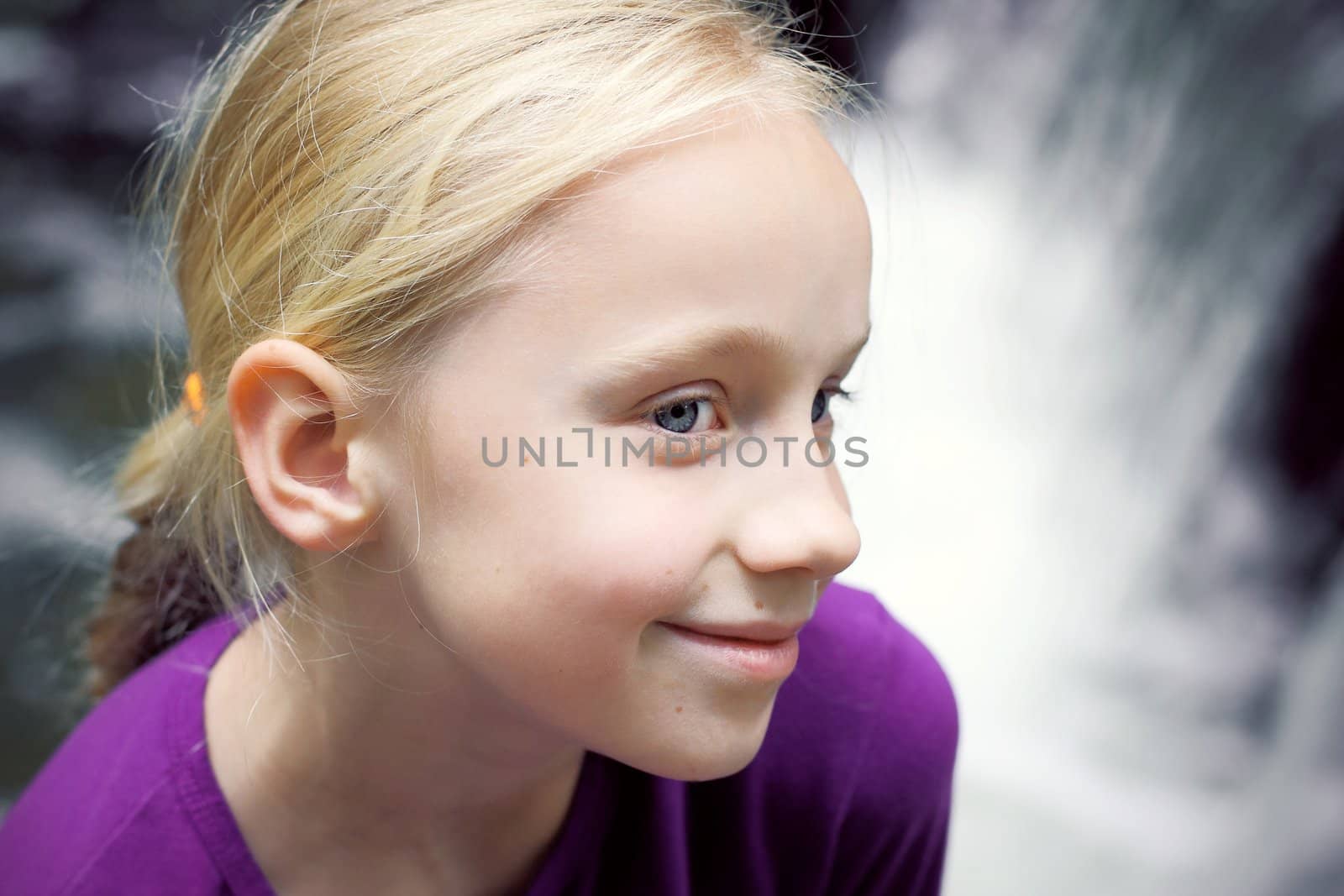 Portrait of Little Girl in Autumn Park