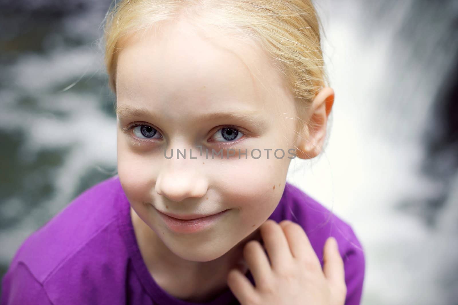 Portrait of Little Girl in Autumn Park