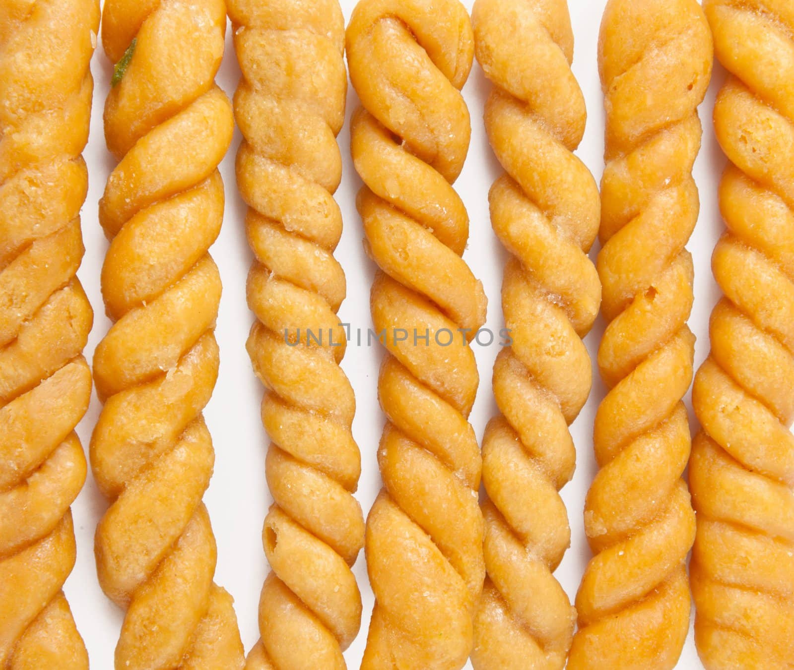 sweet crispy straw on a white background