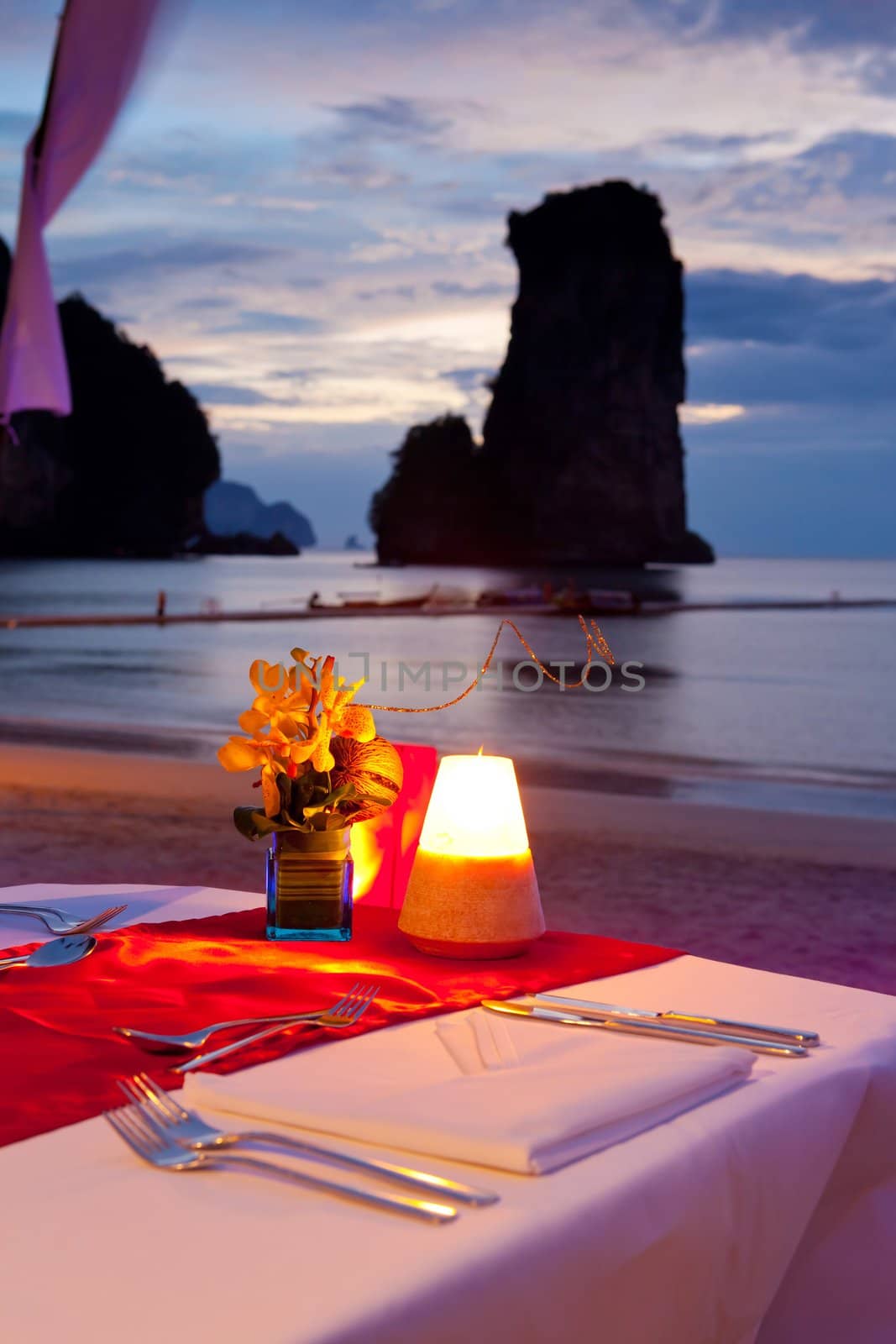 dinner on sunset at beach in Thailand