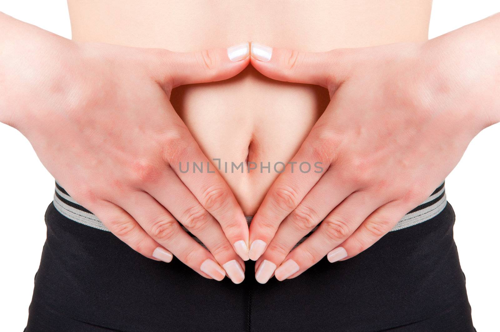 Woman with her hands around her belly button