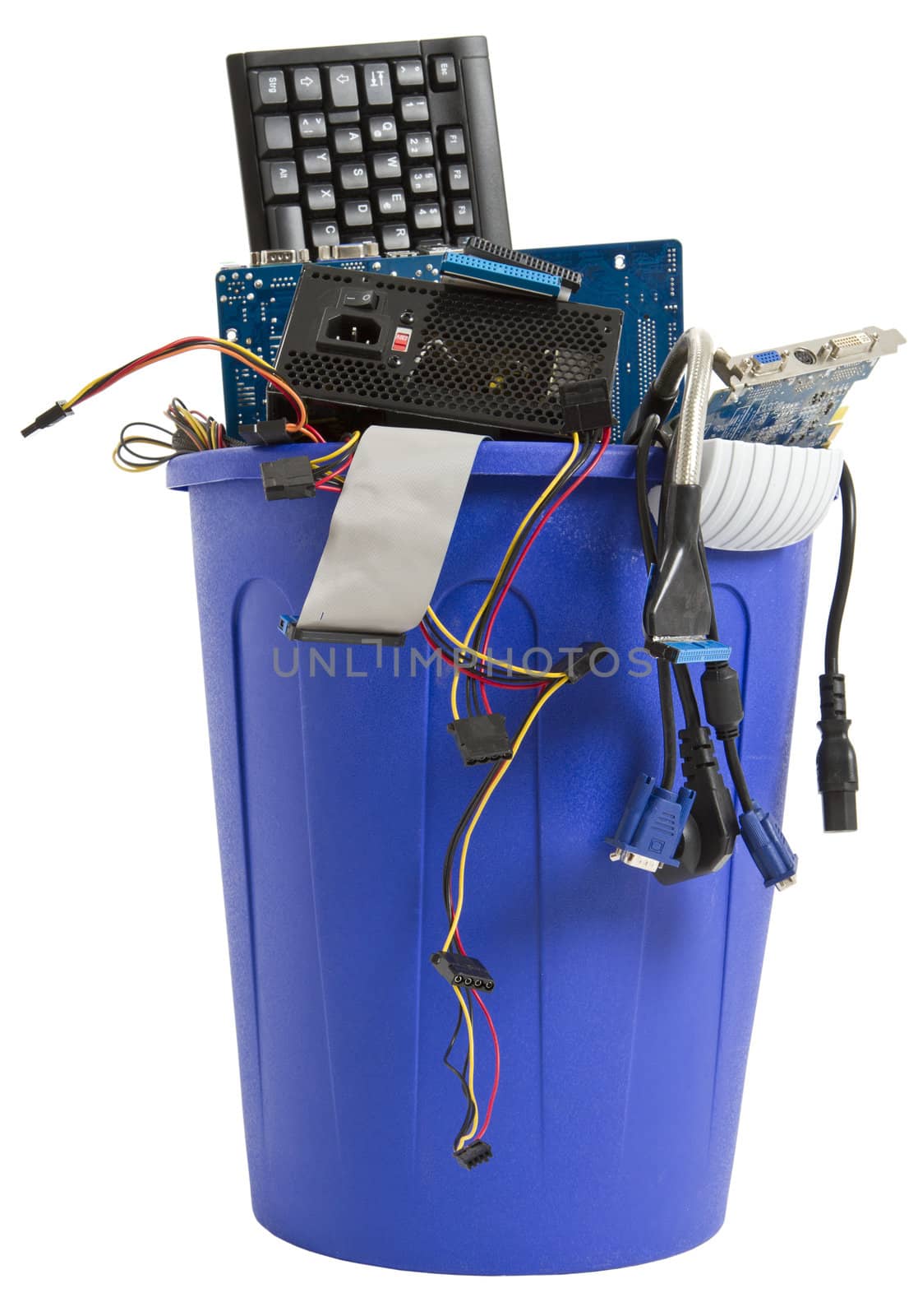 electronic scrap in trash can. keyboard, power supply, cables, logicboard - isolated on white background