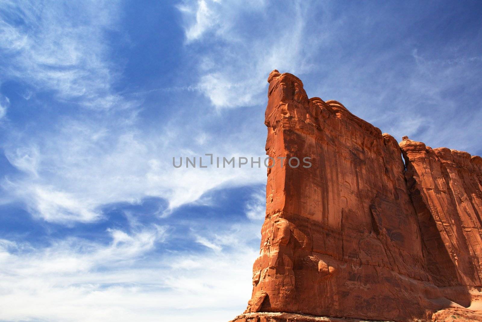 Courthouse Towers Ridge in Arches National Park with dramatic Blue Sky