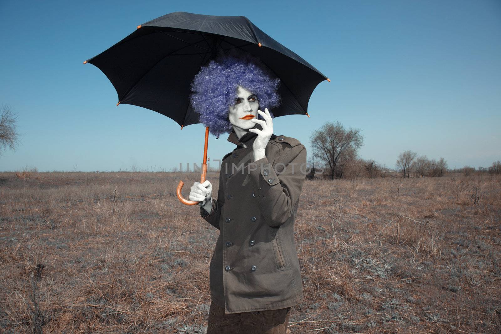 Clown with umbrella by Novic