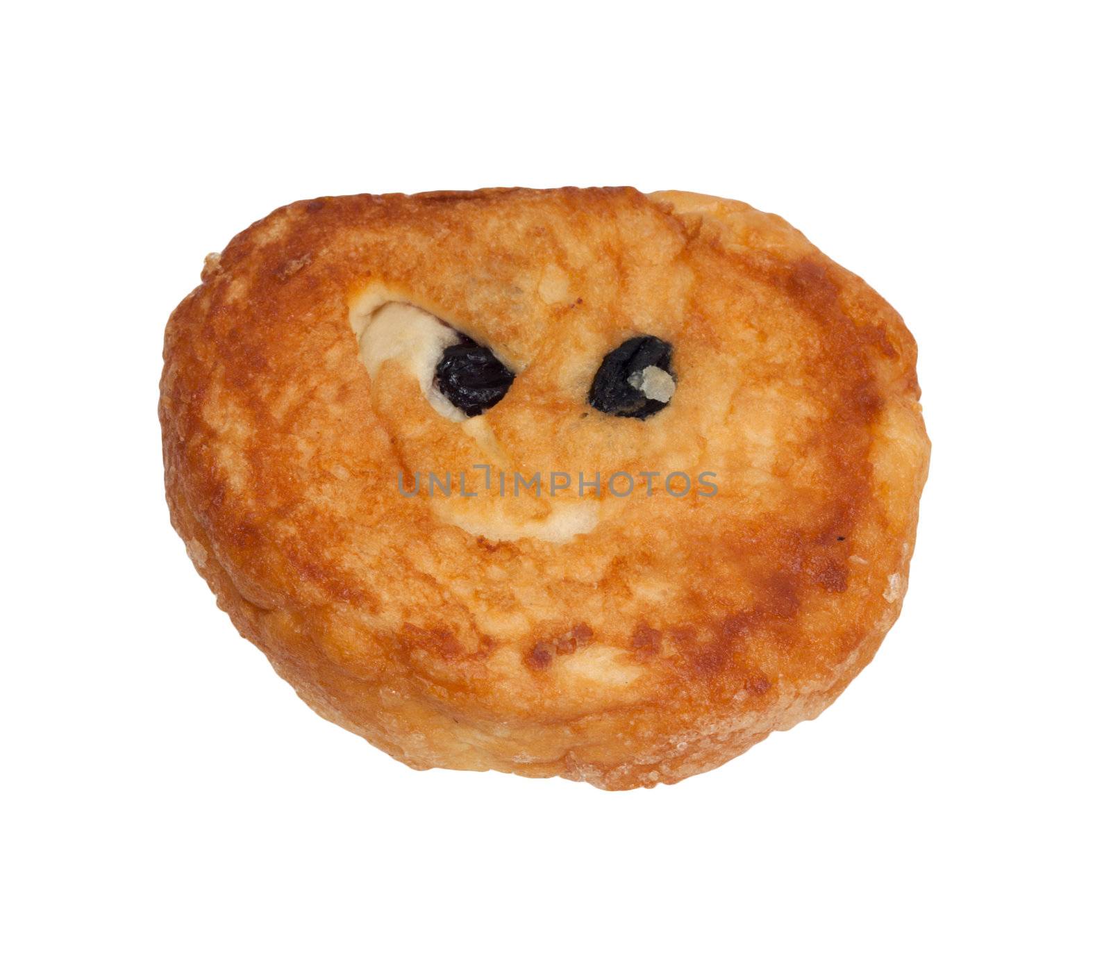 Roll with raisin as two eyes on a white background