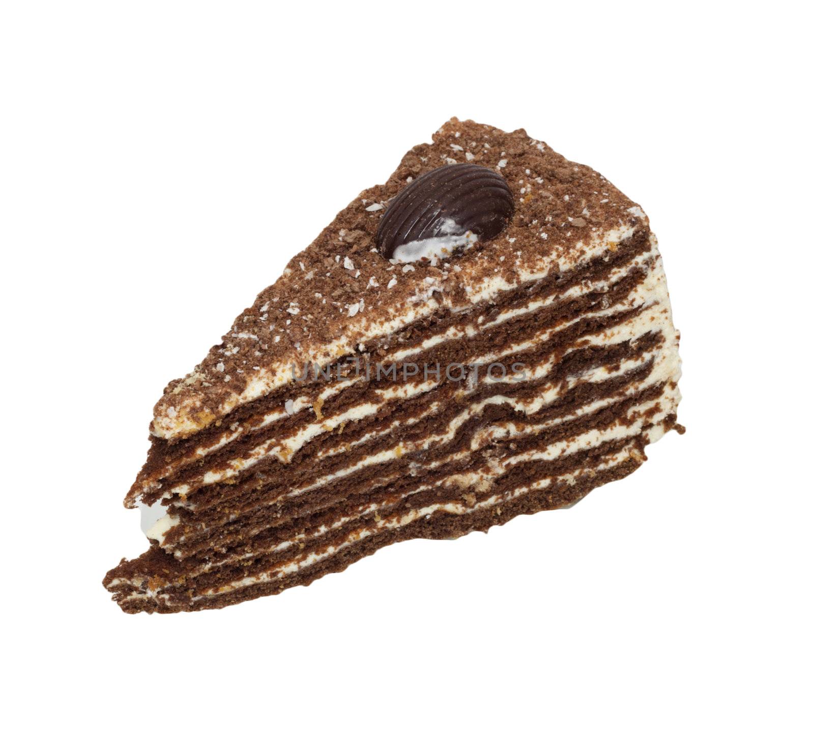 Piece of chocolate cake filled with cream isolated  by schankz
