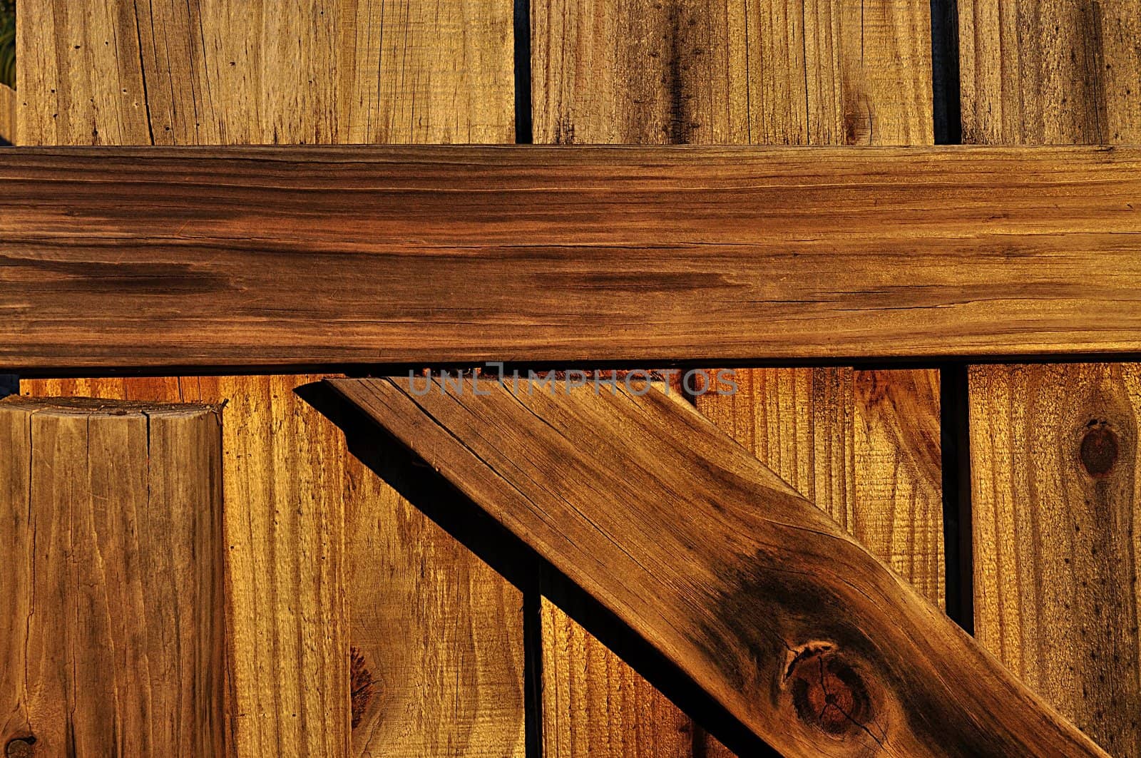 Closeup detail of a wooden, backyard gate