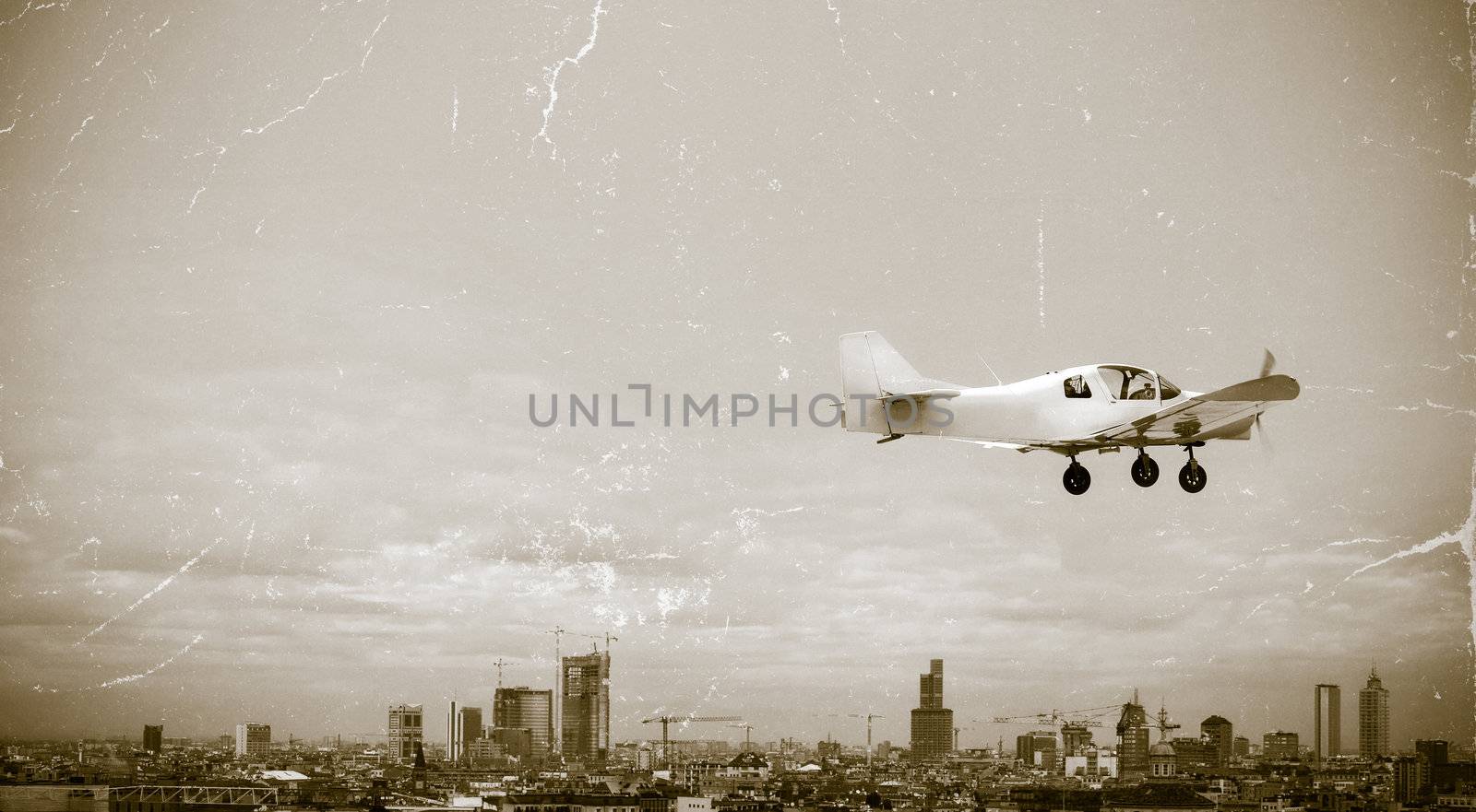 Personal airplane over the city by silent47
