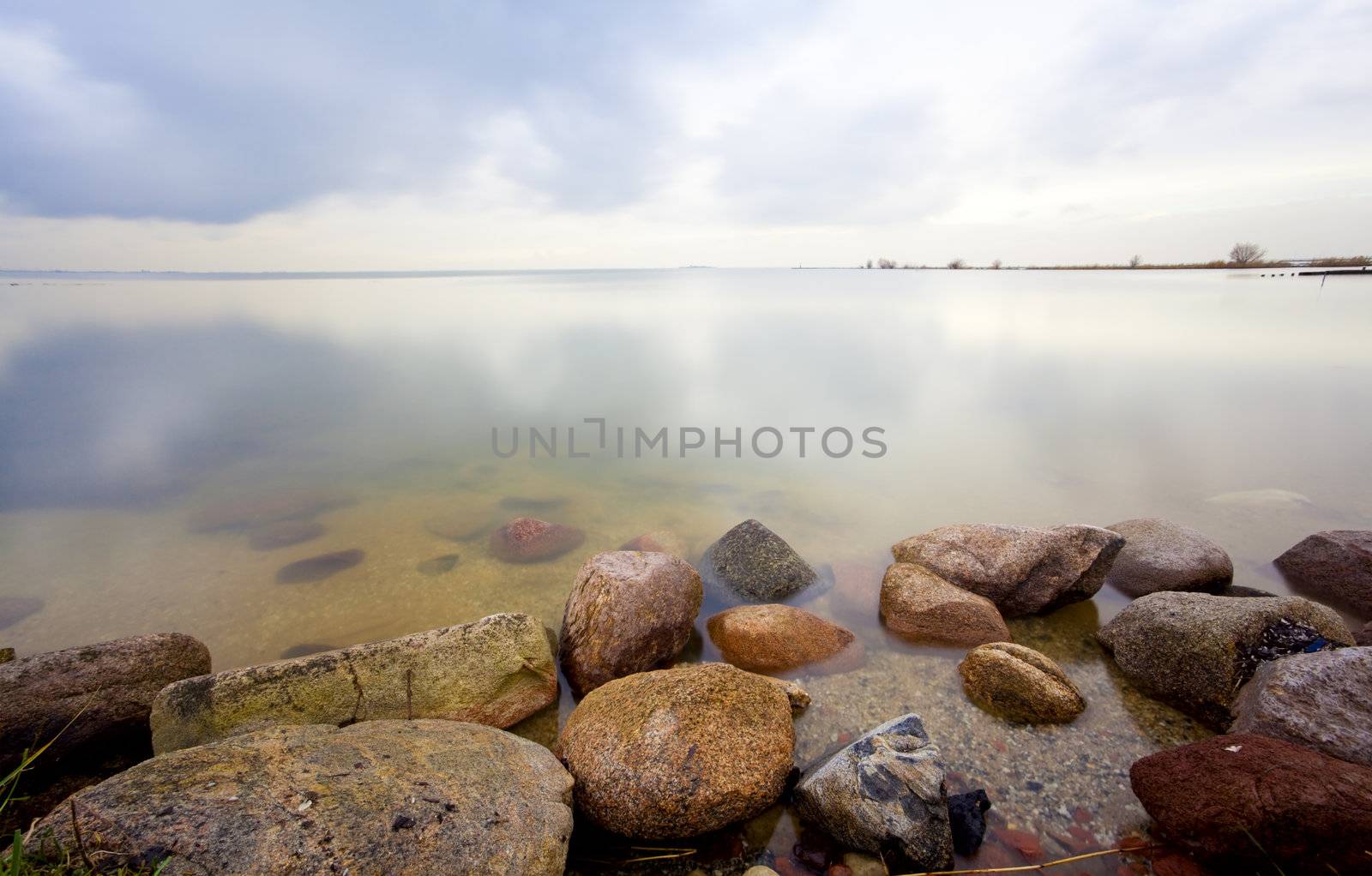 stones in sea and sky with long exposure