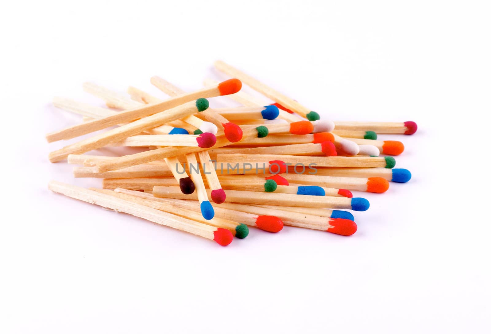 Stack of Multi Colored Matches isolated on white background