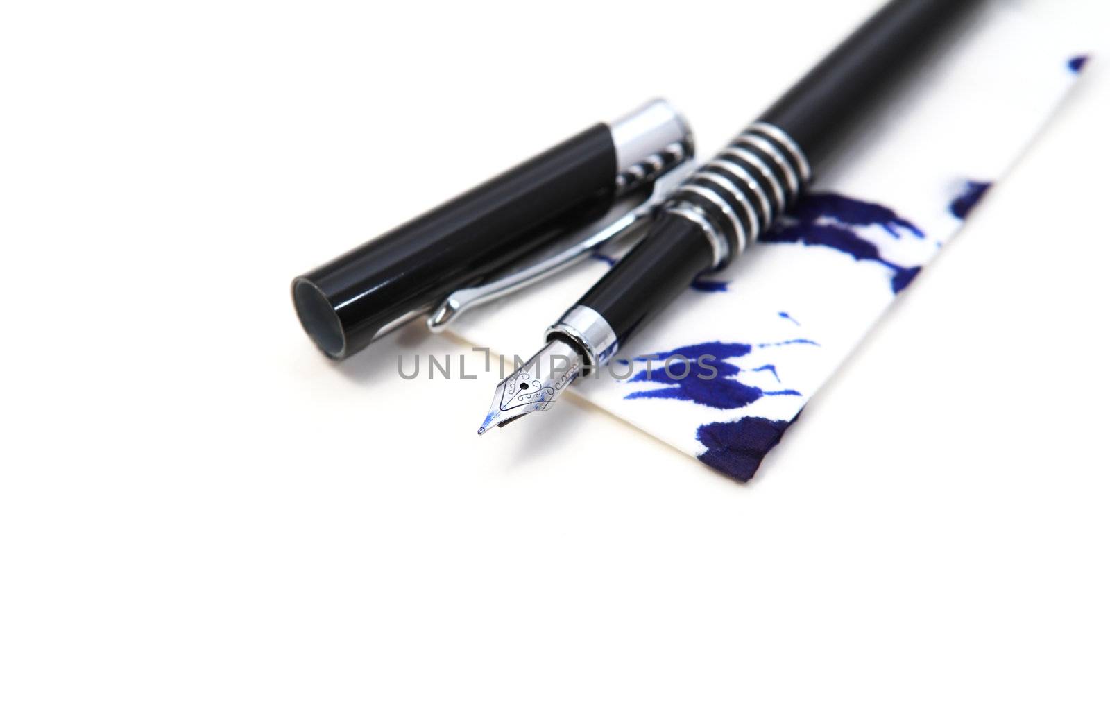 ink fountain black pen on white background