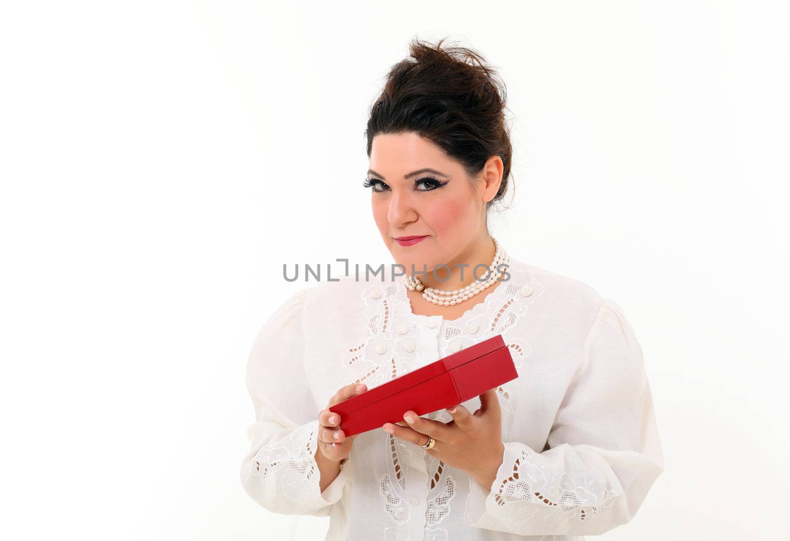 Beautiful plus size woman opening a gift