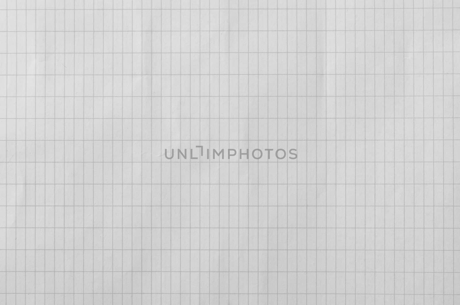 detail of a wrinkled paper sheet with vertical rectangular pattern, horizontal shot