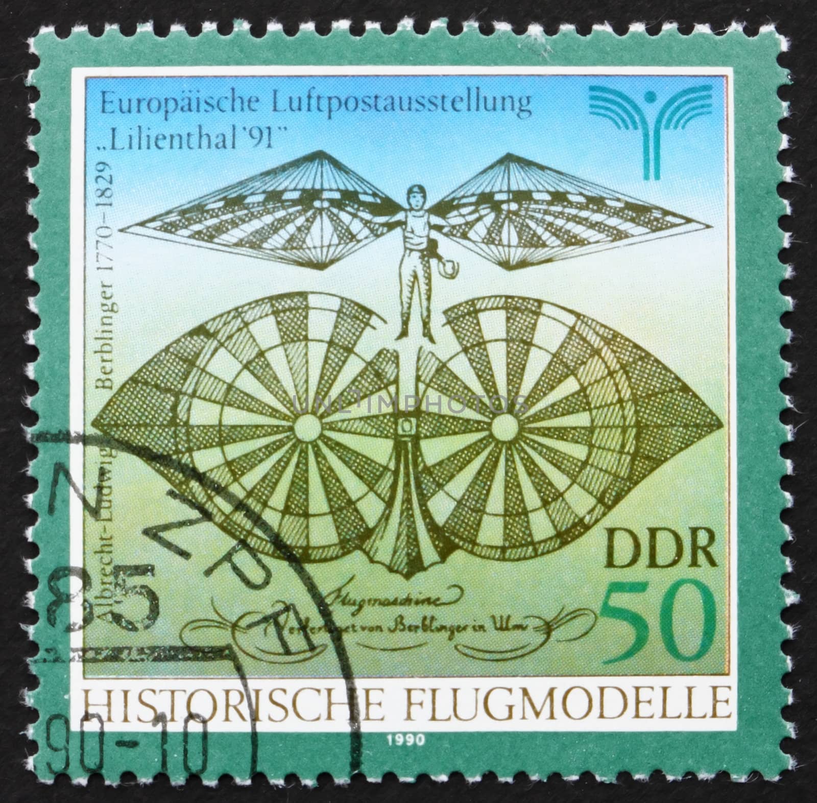 GDR - CIRCA 1990: a stamp printed in GDR shows Flying Machine Designed by Albrecht Berblinger, circa 1990