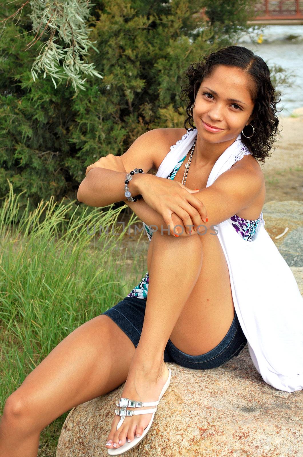 African american female beauty posing outside.