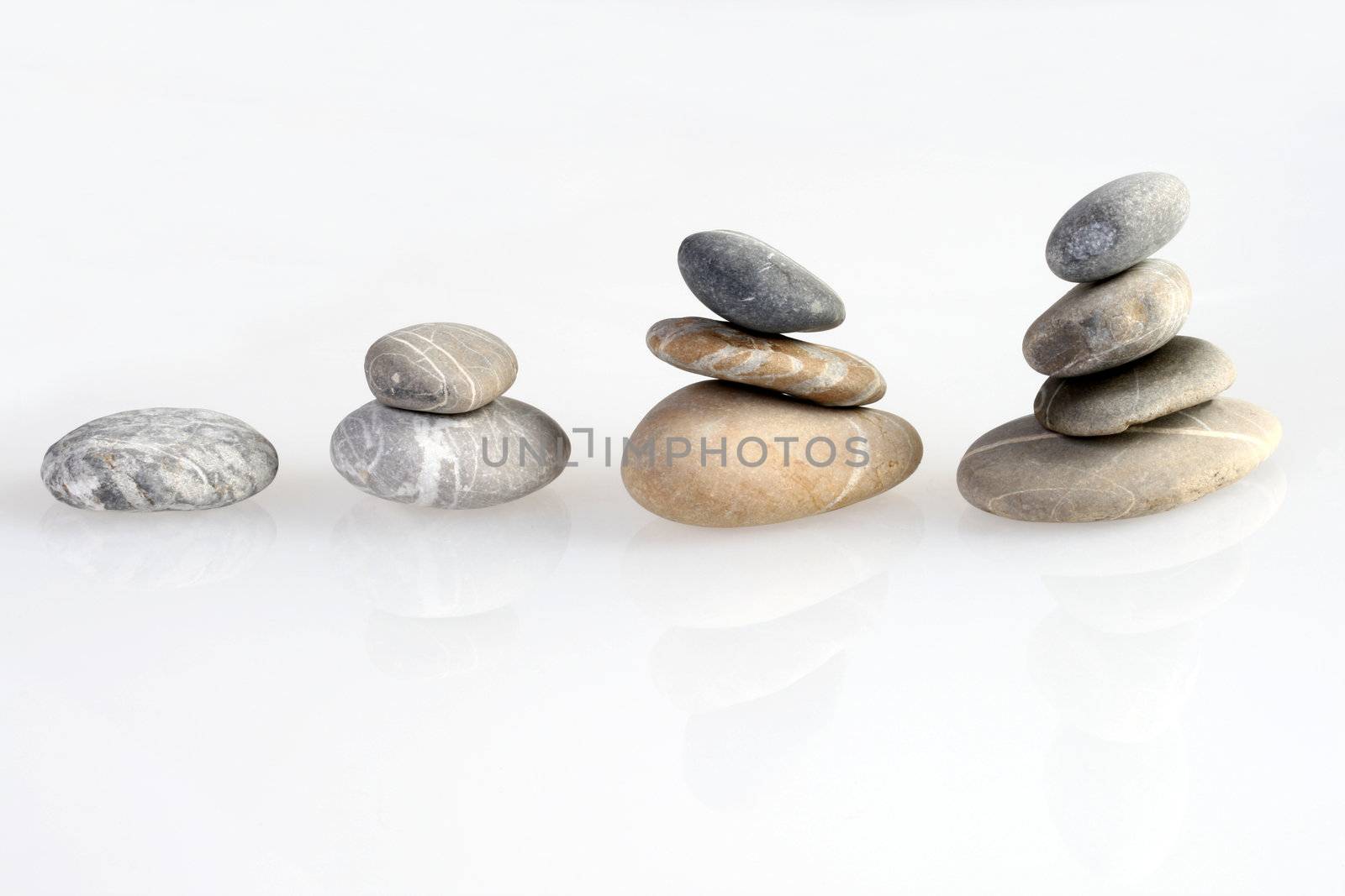 round stones in a line. Concept for statistic, growth etc.