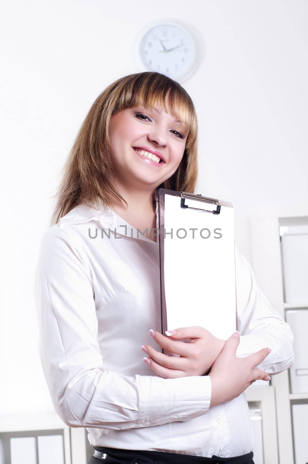 cute woman with tablet in office, portrait