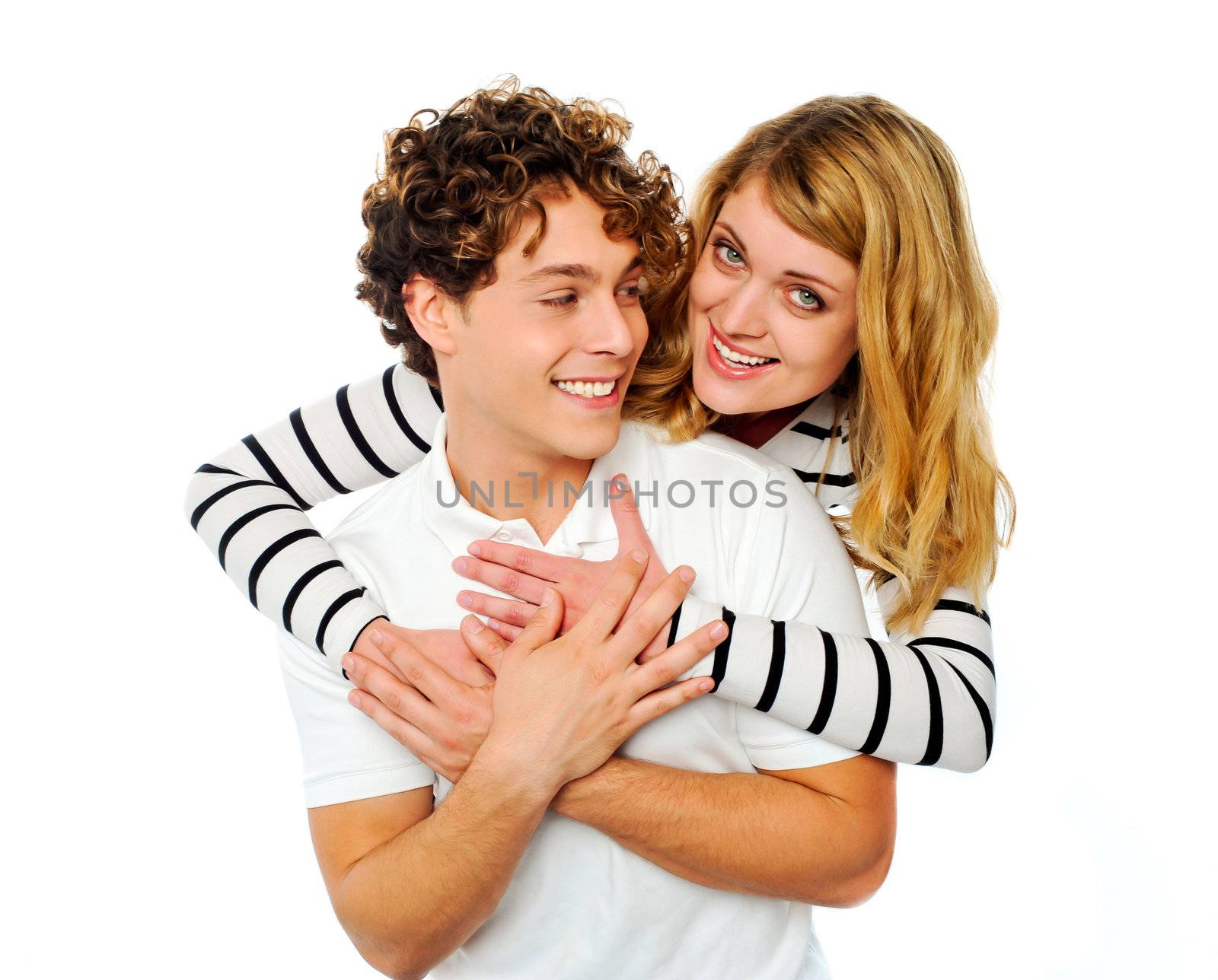 Attractive young couple hugging each other by stockyimages