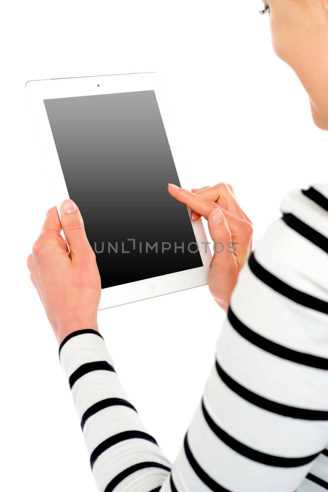 Cropped image of smiling woman using tablet pc against white background