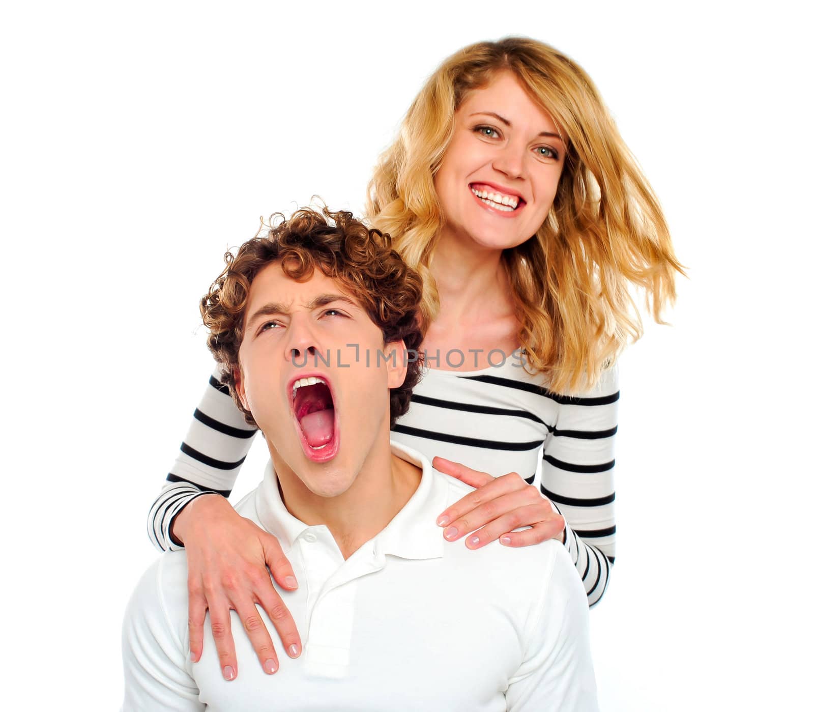 Couple, girl smiling boy yawning by stockyimages