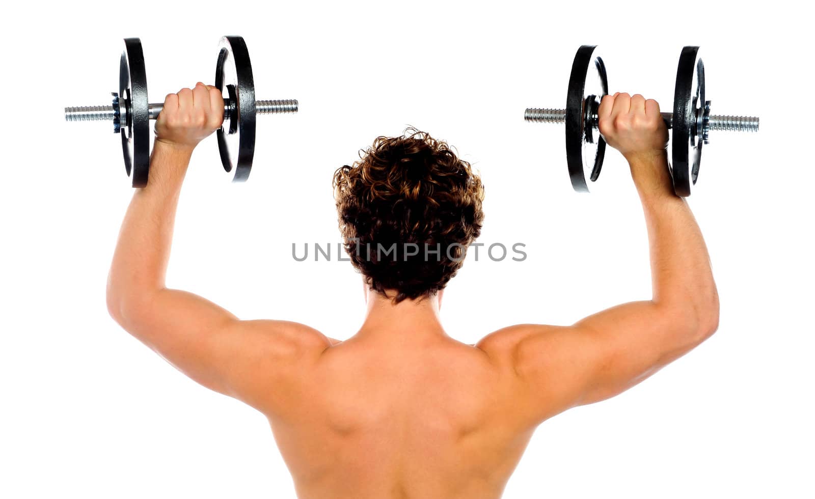 Rear view of a young male bodybuilder by stockyimages
