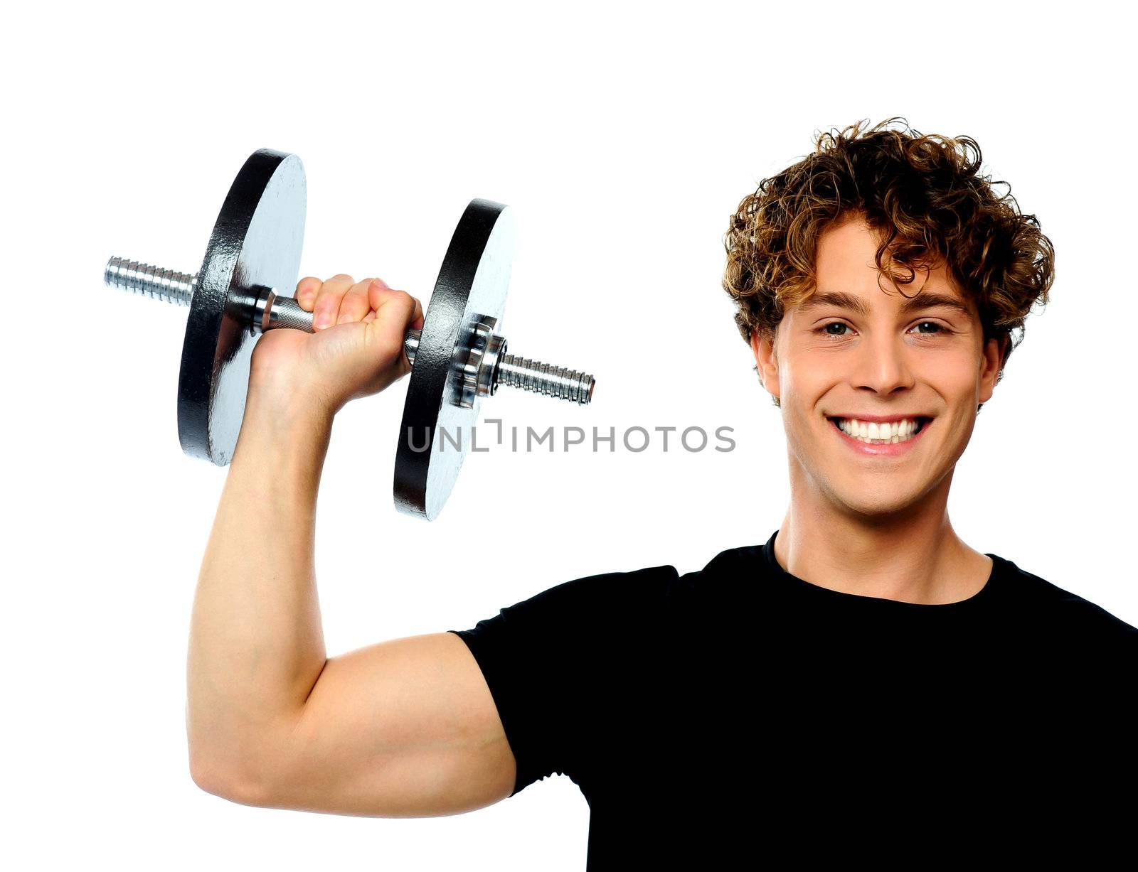 Powerful muscular young man lifting weight, smiling pose